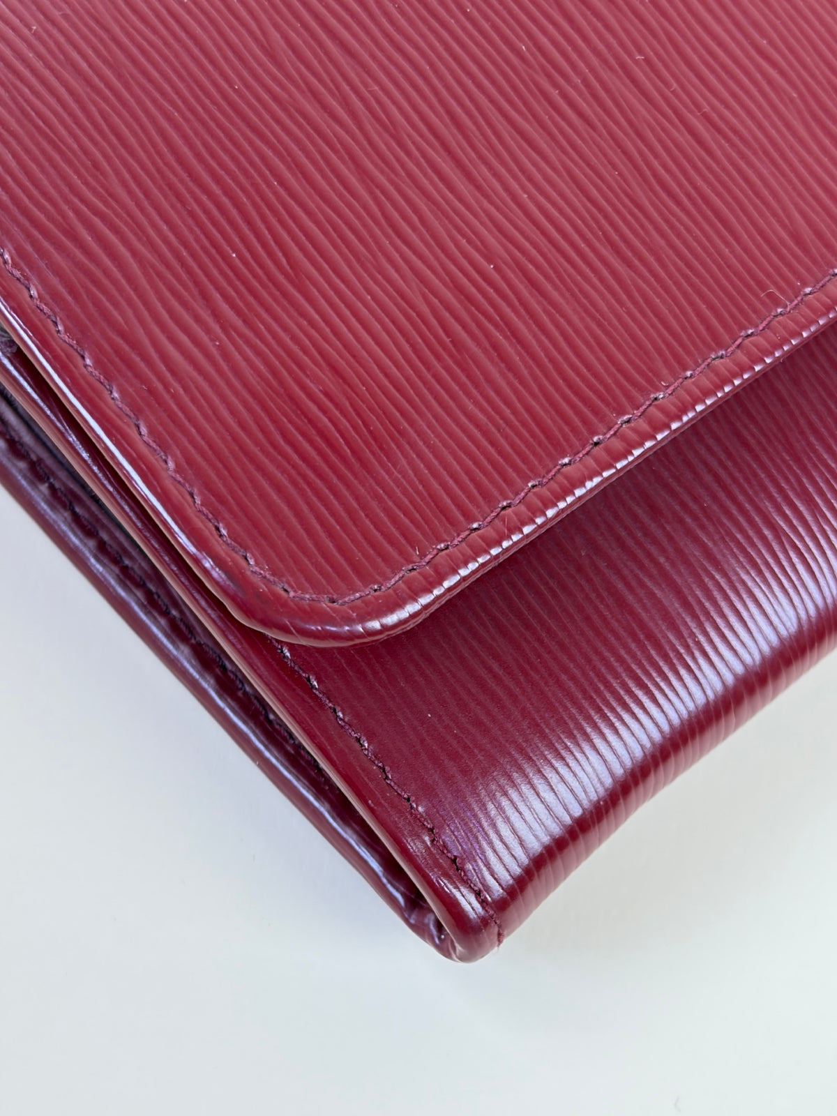 Prada rubino vitello move leather wallet on chain clutch