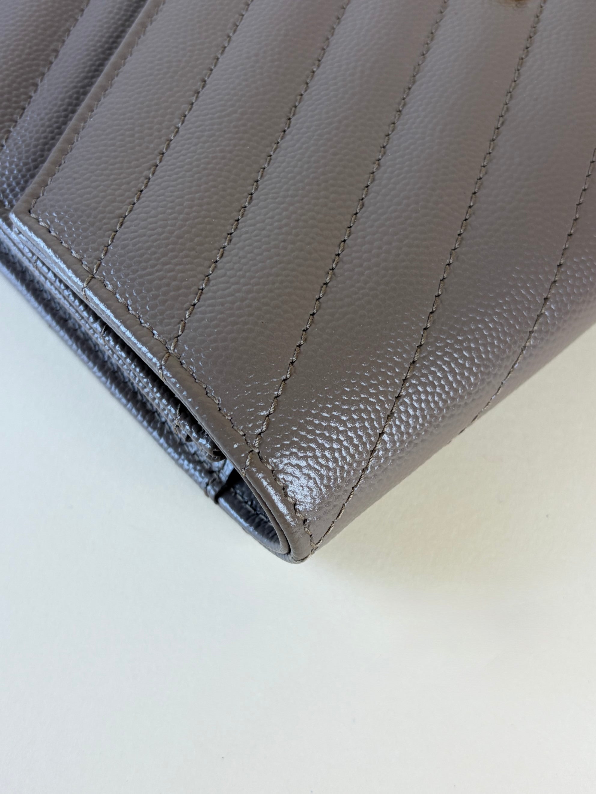 YSL Cassandre flap beige caviar pouch