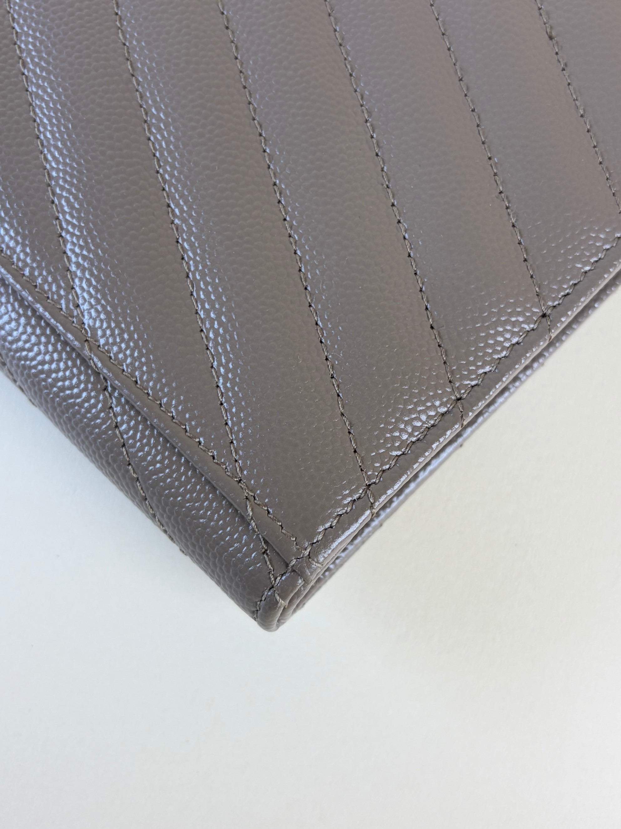 YSL Cassandre flap beige caviar pouch