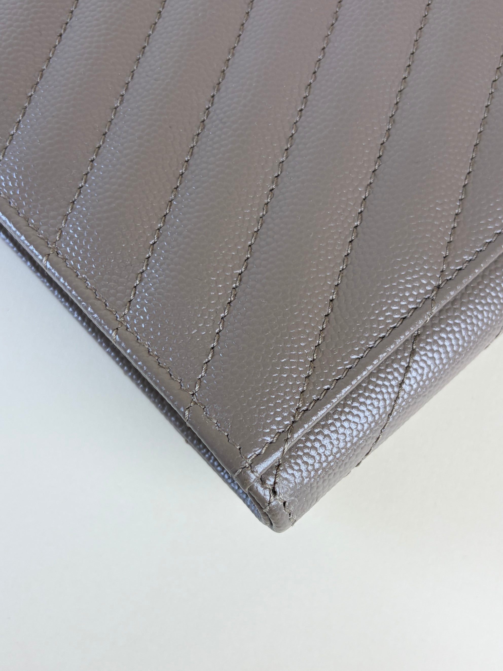 YSL Cassandre flap beige caviar pouch