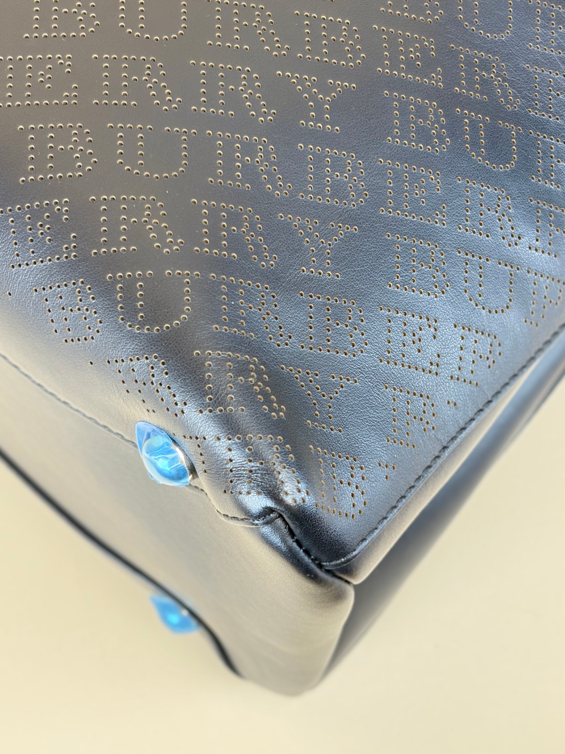 Burberry Black perforated leather logo banner medium tote bag