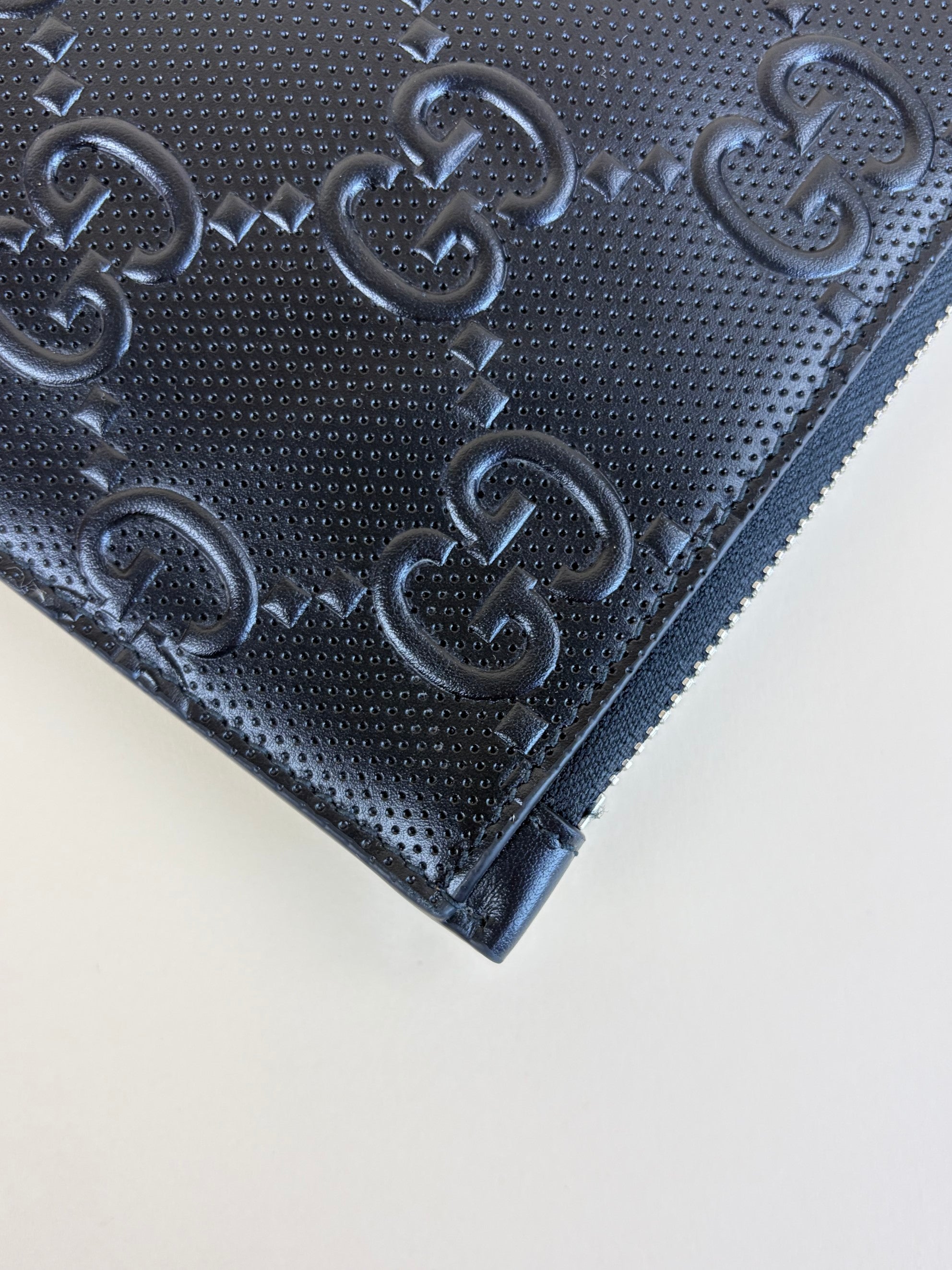 Gucci black calfskin gg tennis embossed wristlet pouch