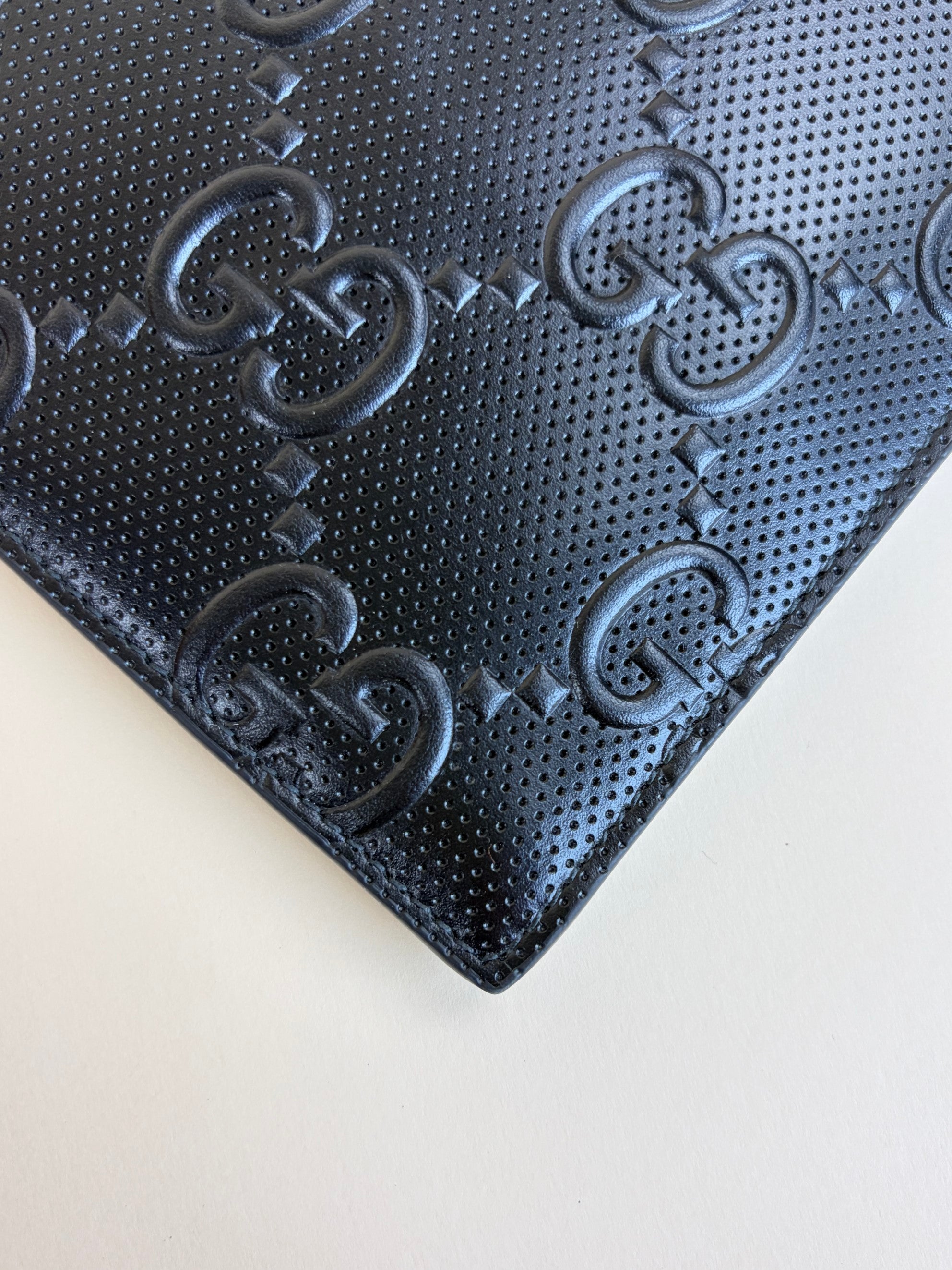Gucci black calfskin gg tennis embossed wristlet pouch