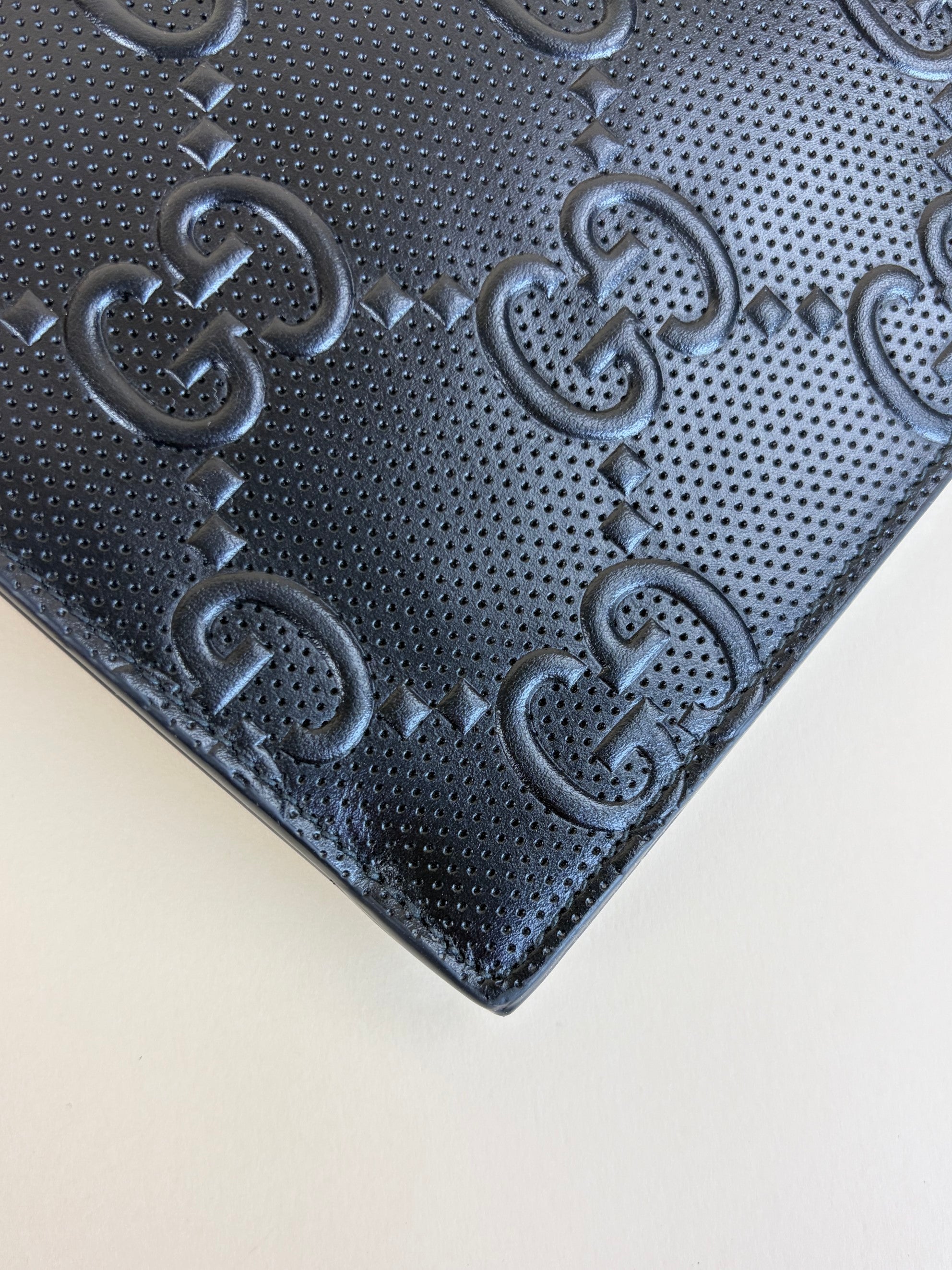 Gucci black calfskin gg tennis embossed wristlet pouch