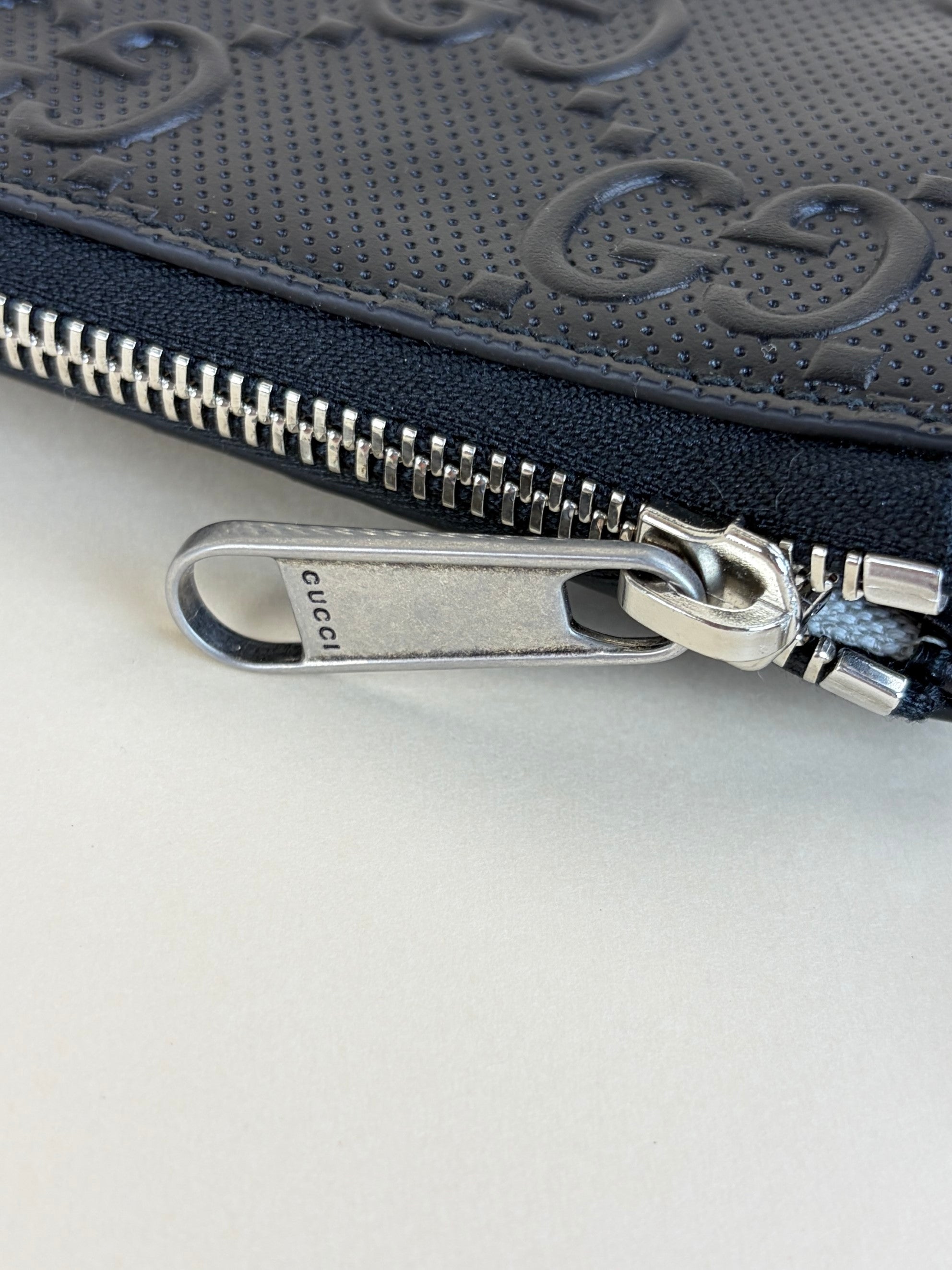 Gucci black calfskin gg tennis embossed wristlet pouch