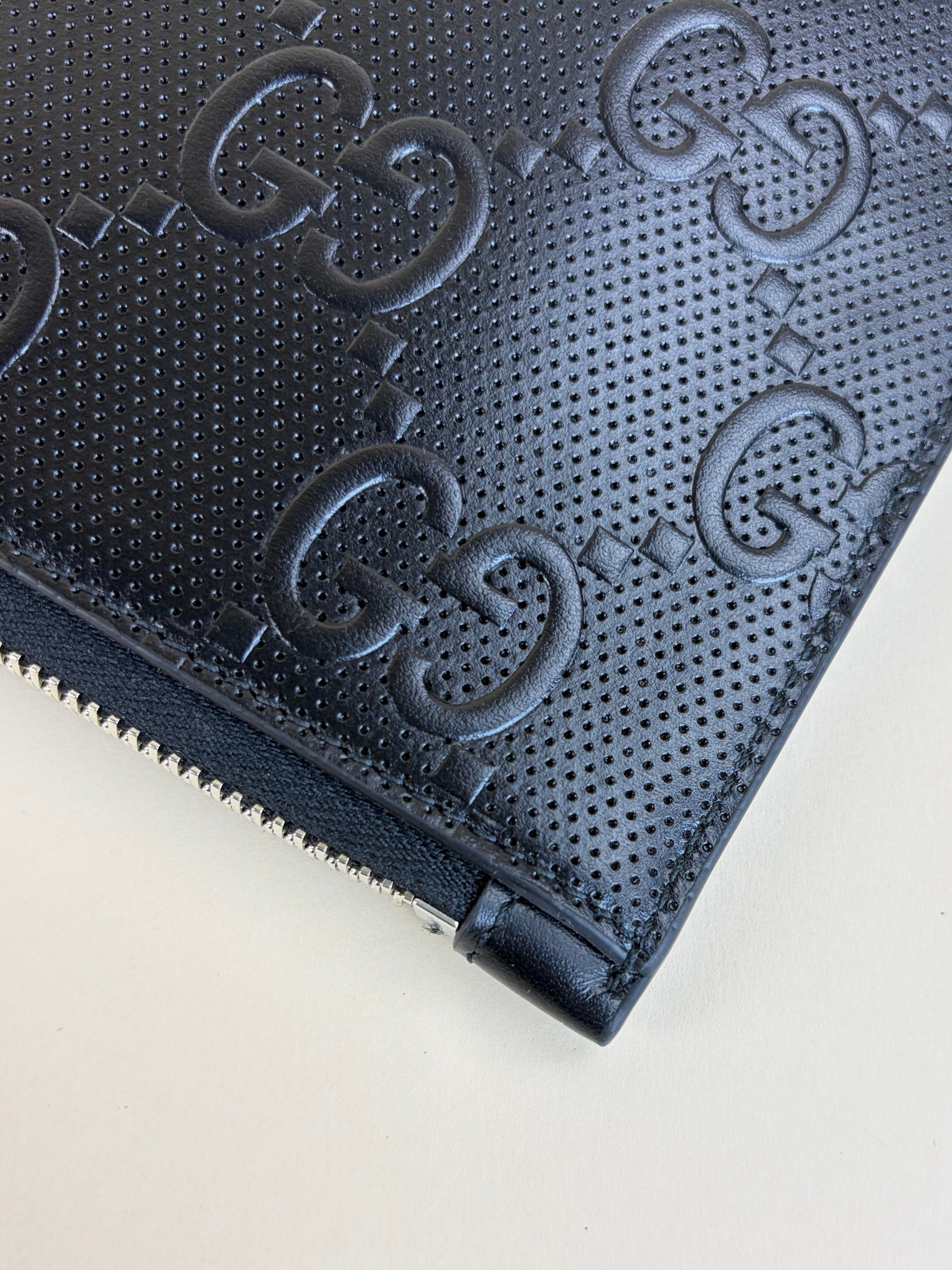 Gucci black calfskin gg tennis embossed wristlet pouch