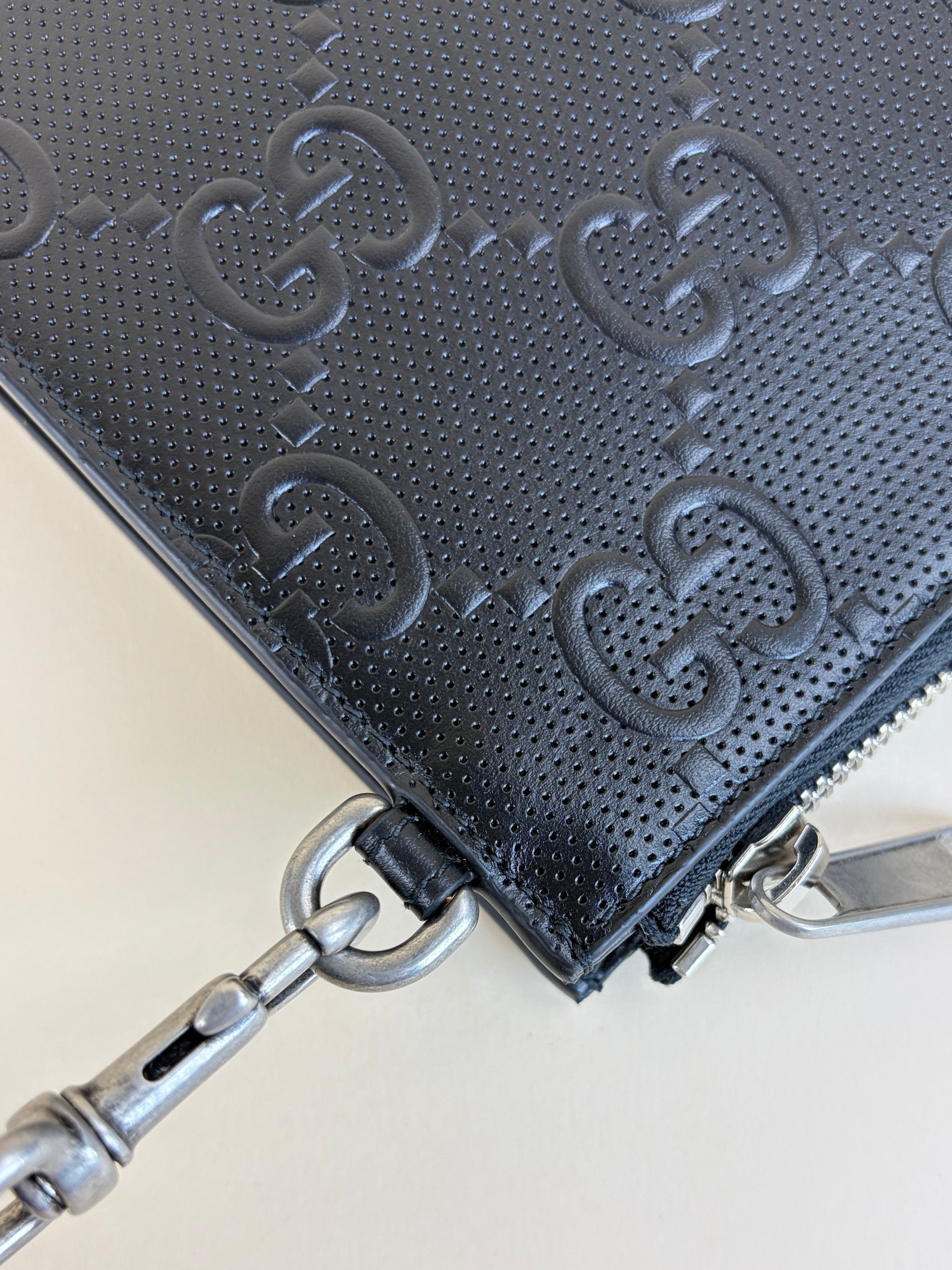 Gucci black calfskin gg tennis embossed wristlet pouch