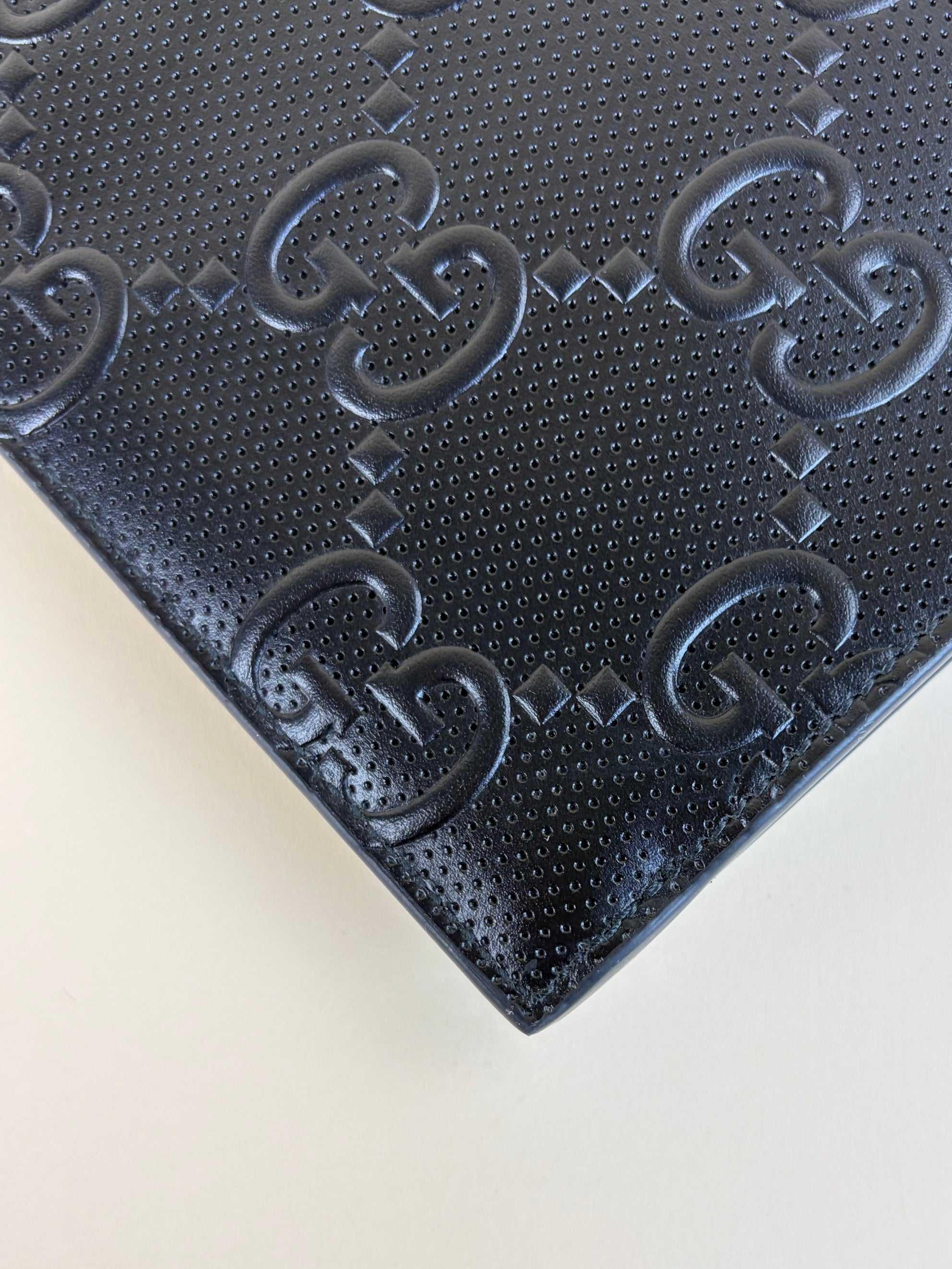 Gucci black calfskin gg tennis embossed wristlet pouch