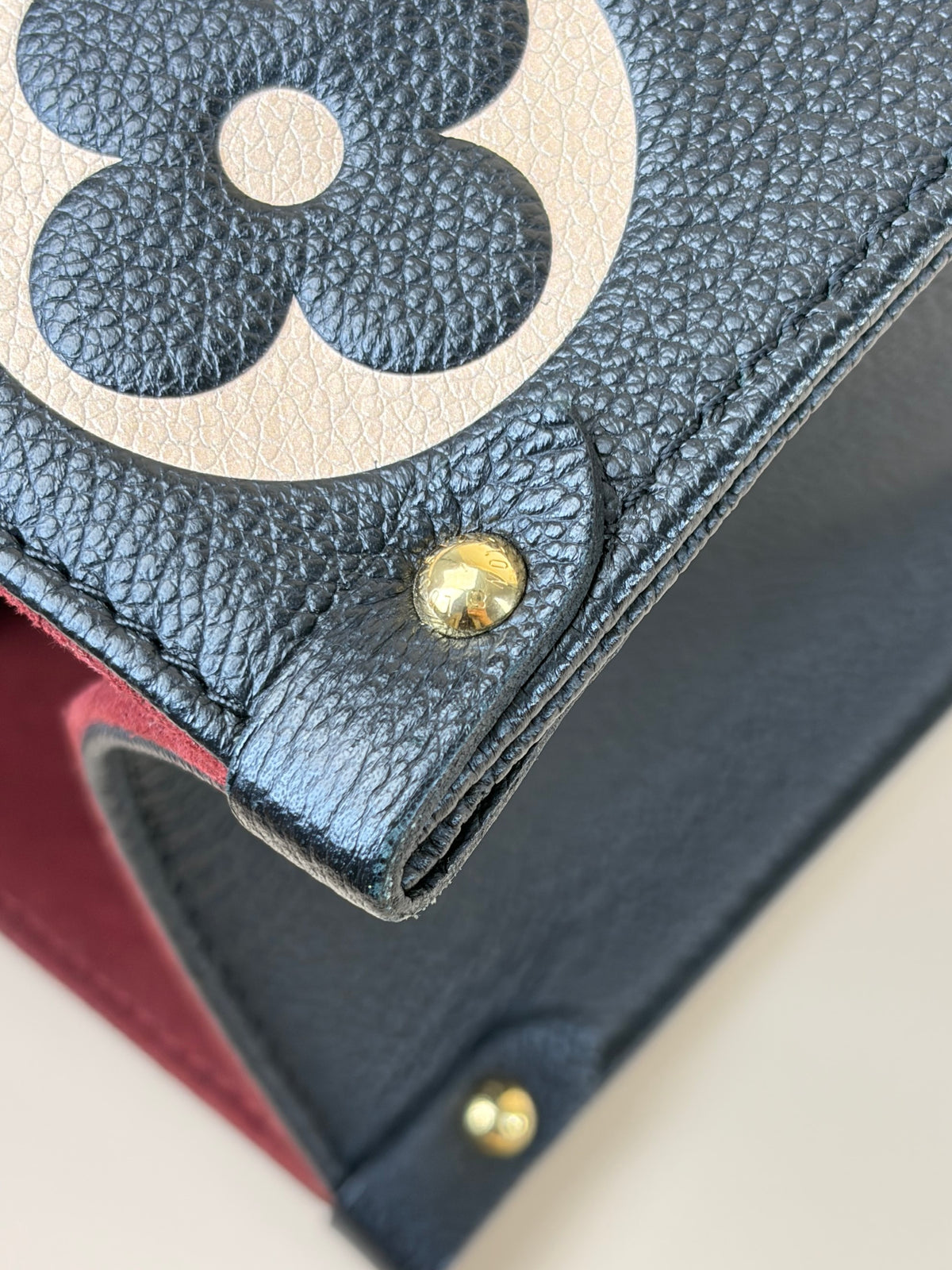 Louis Vuitton bicolor Monogram giant empriente on the go mm bag