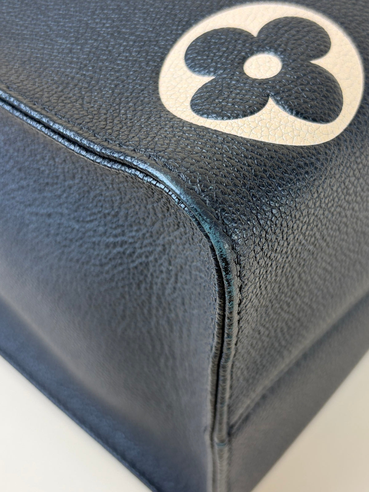 Louis Vuitton bicolor Monogram giant empriente on the go mm bag