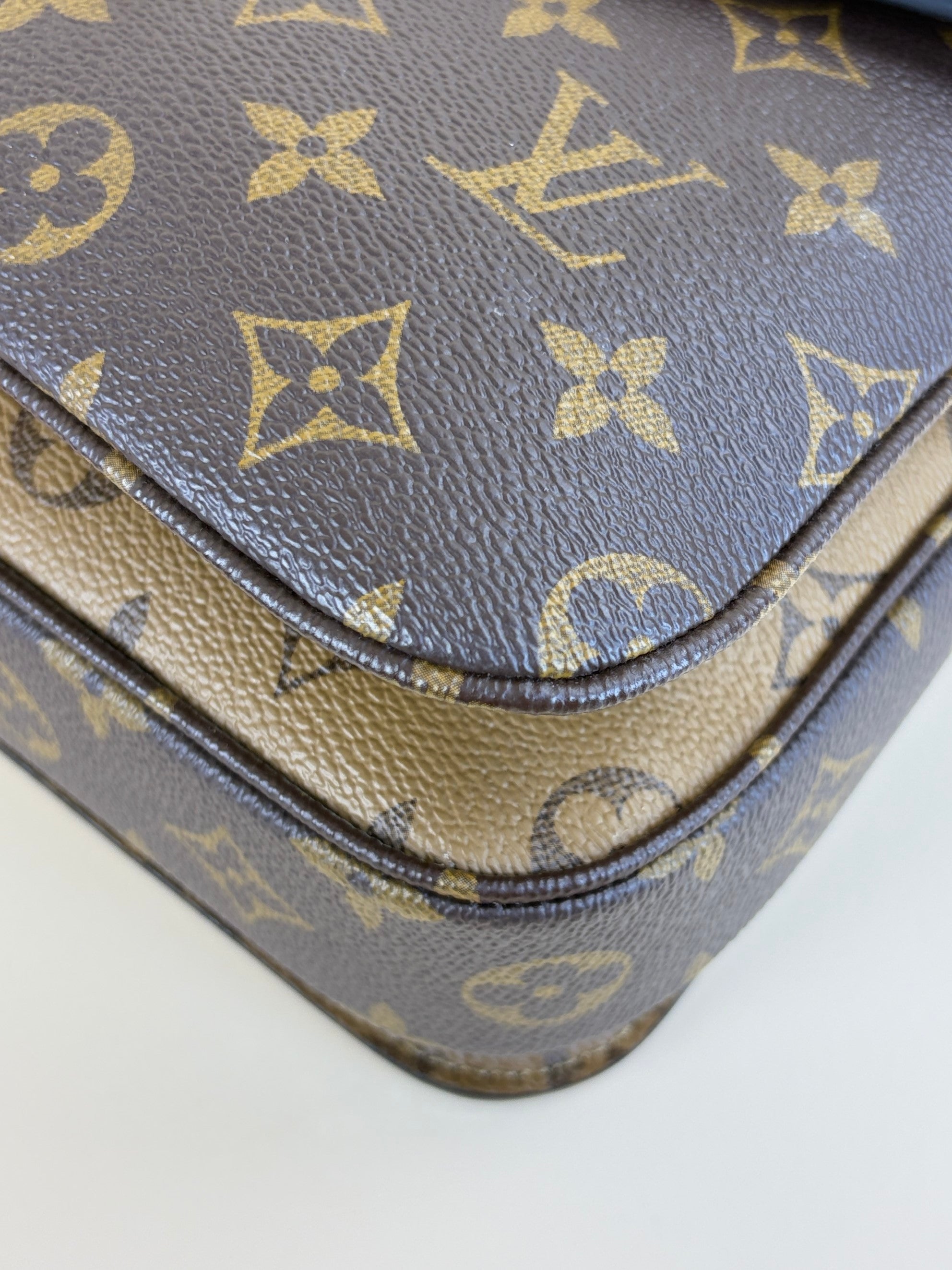 Louis Vuitton Monogram reverse canvas pochette Metis