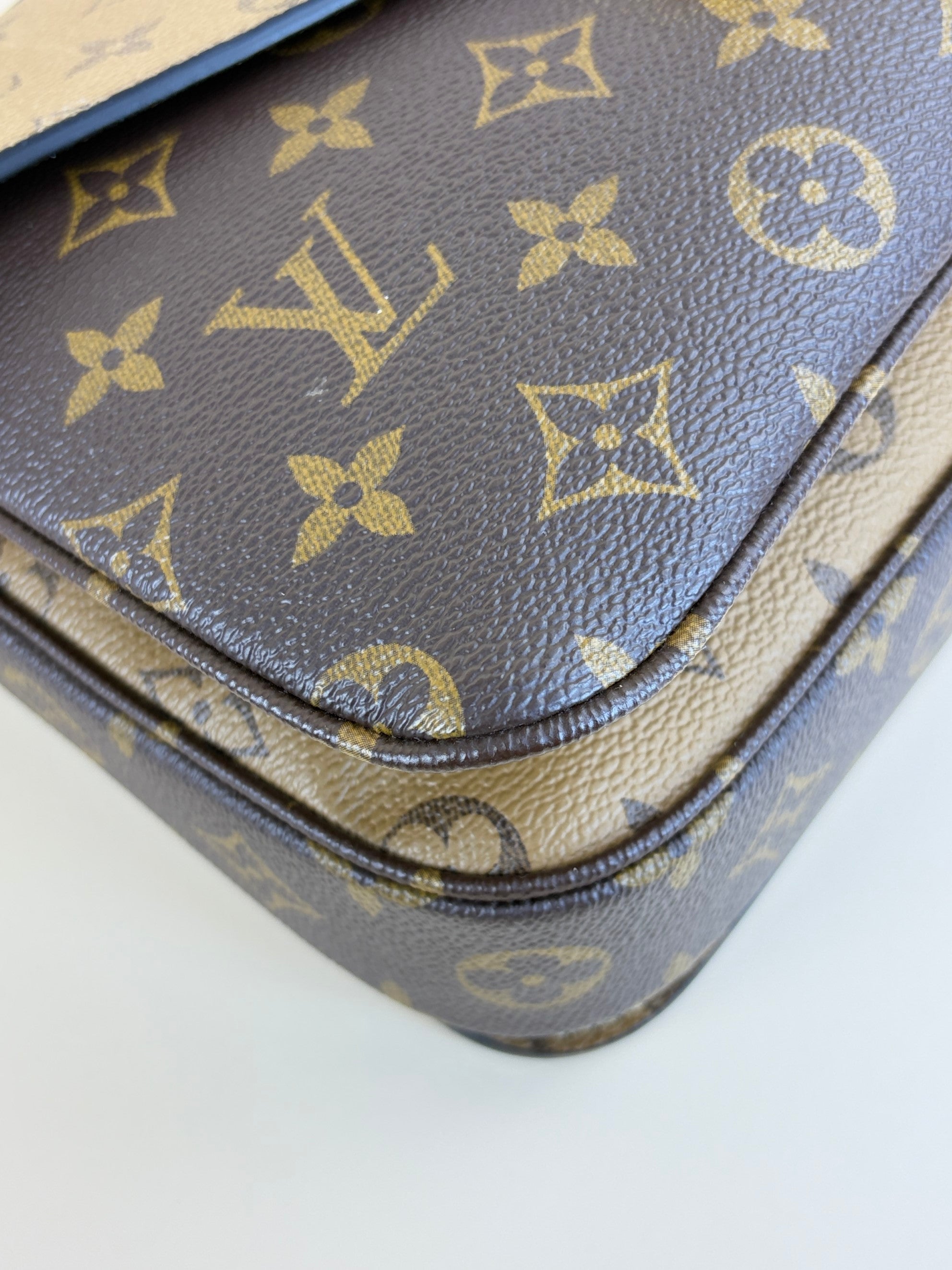 Louis Vuitton Monogram reverse canvas pochette Metis