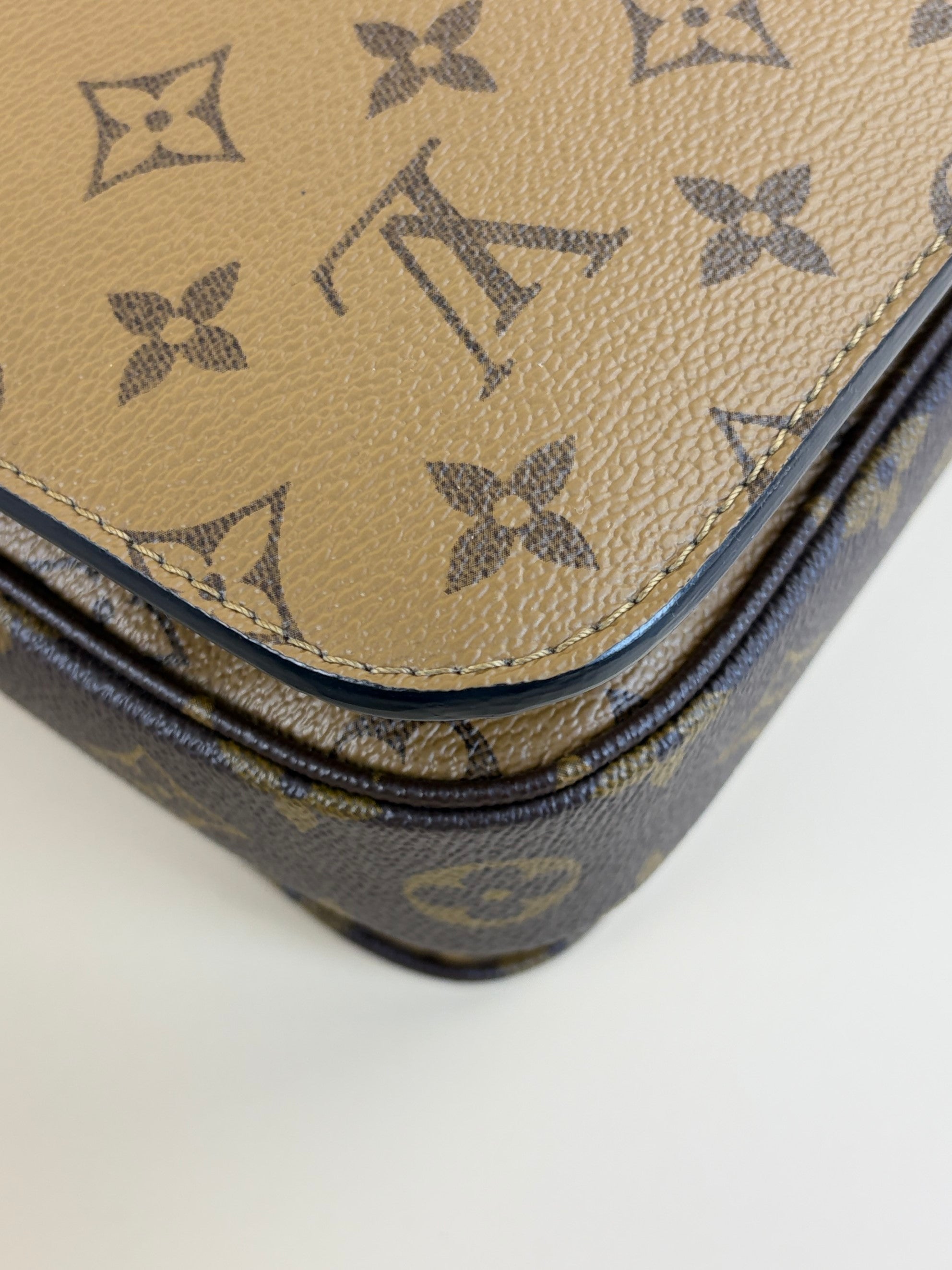Louis Vuitton Monogram reverse canvas pochette Metis