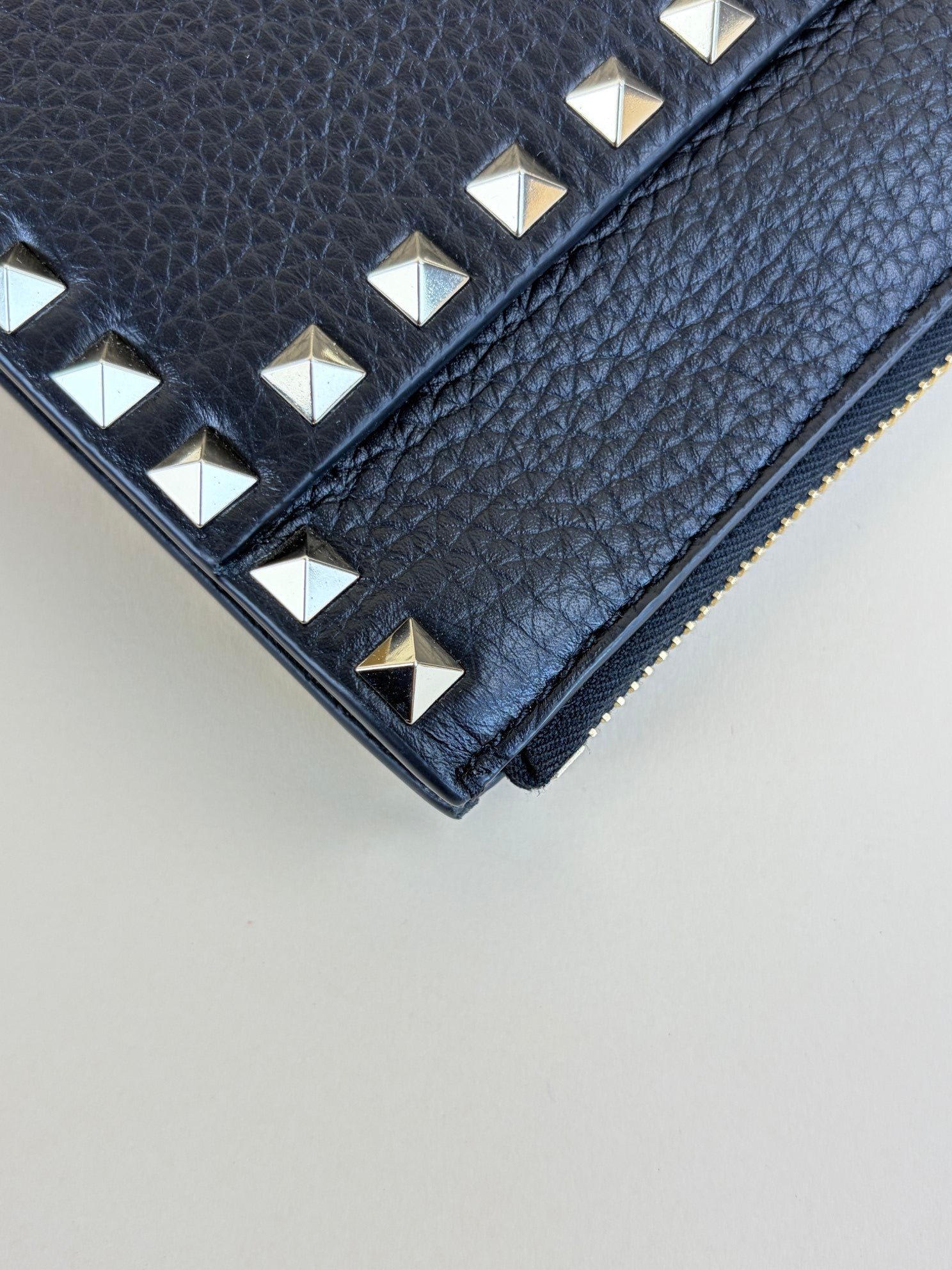 Valentino Black pebbled calfskin rockstud medium zip pouch