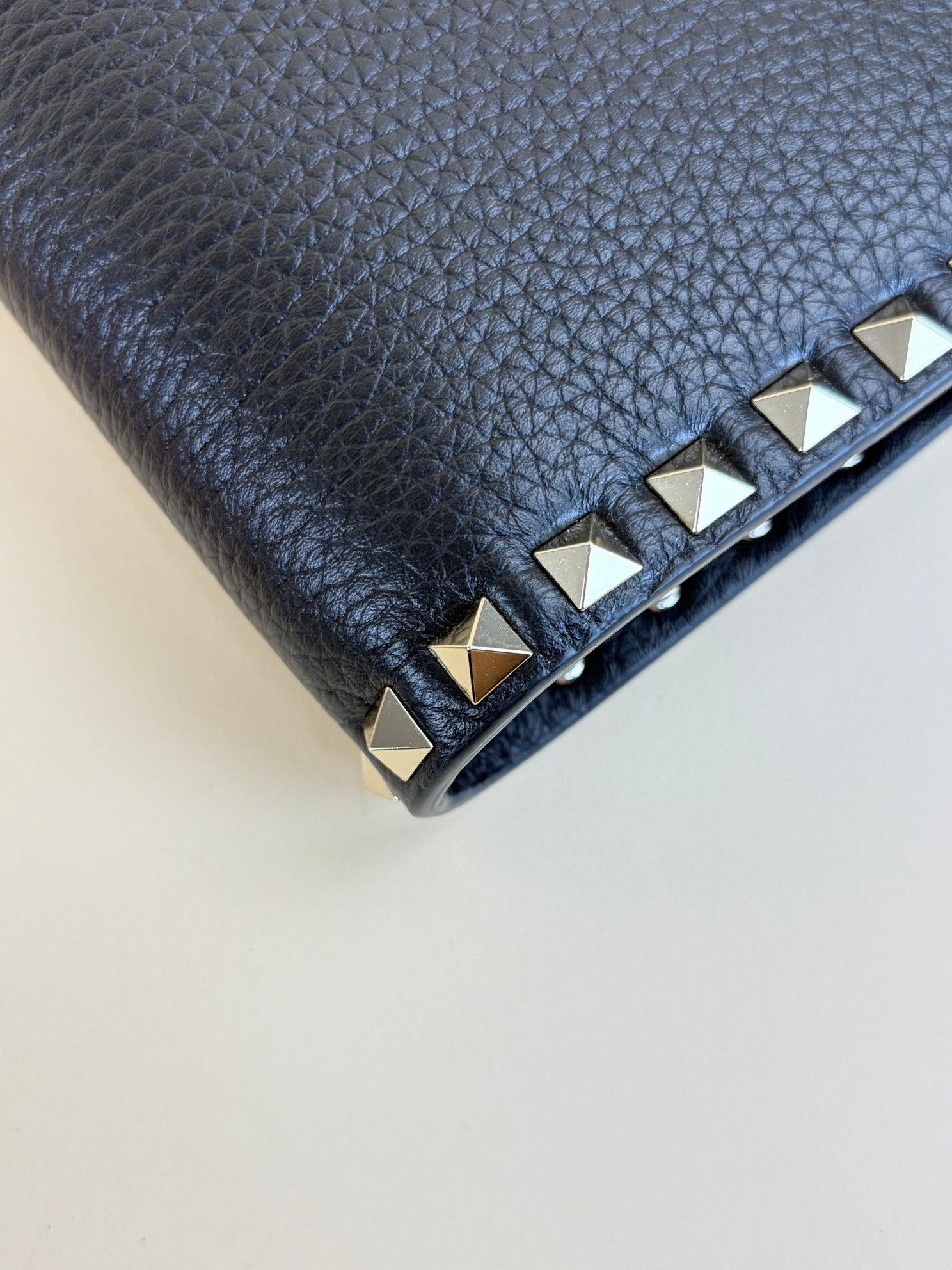 Valentino Black pebbled calfskin rockstud medium zip pouch