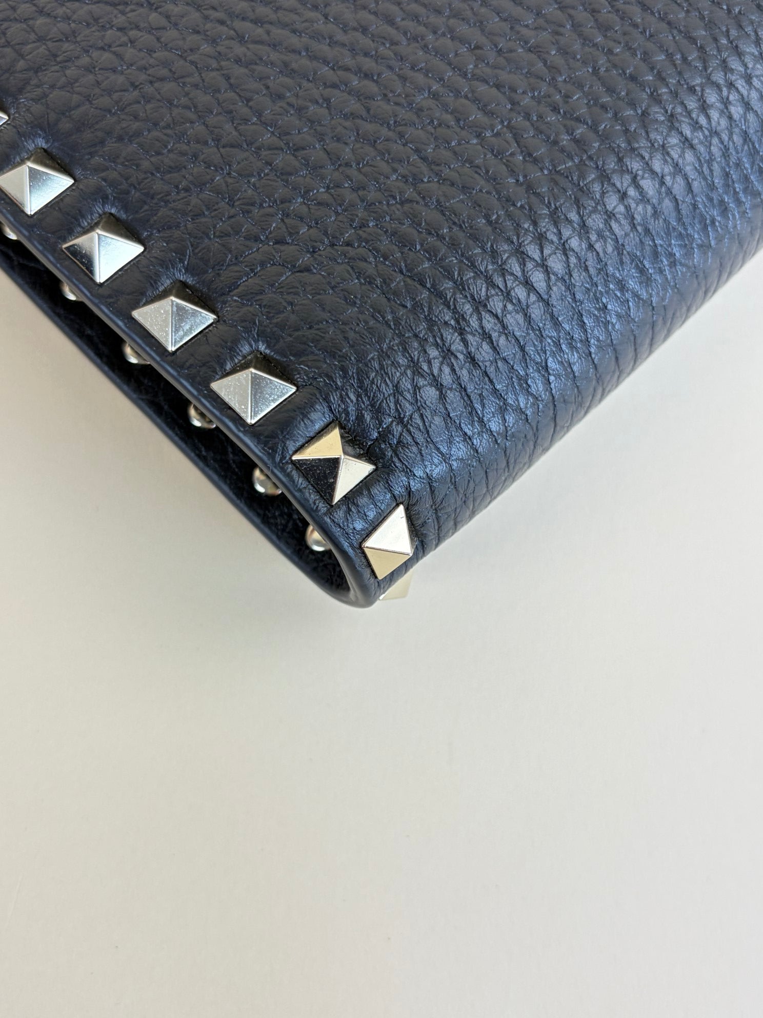 Valentino Black pebbled calfskin rockstud medium zip pouch