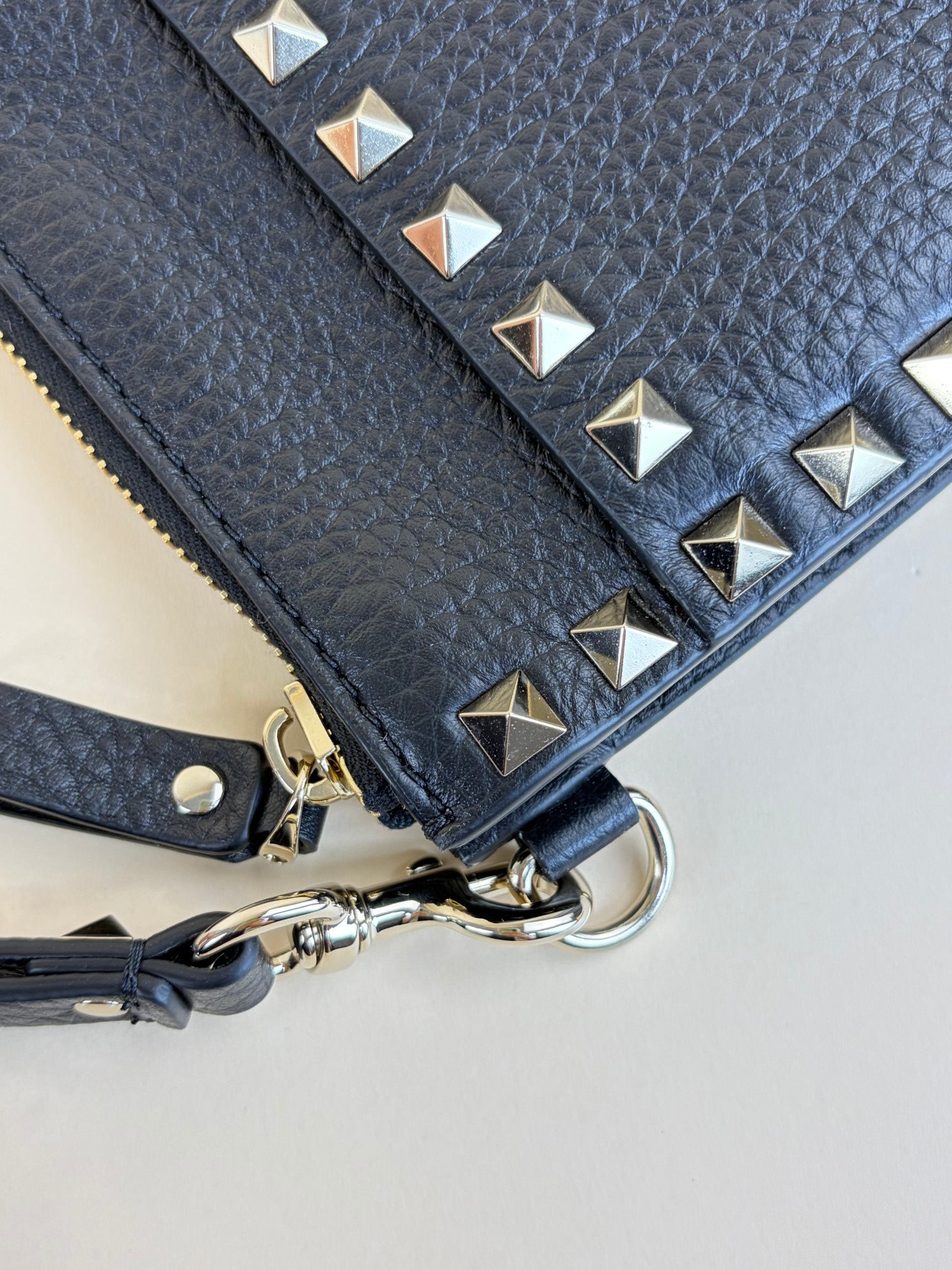 Valentino Black pebbled calfskin rockstud medium zip pouch