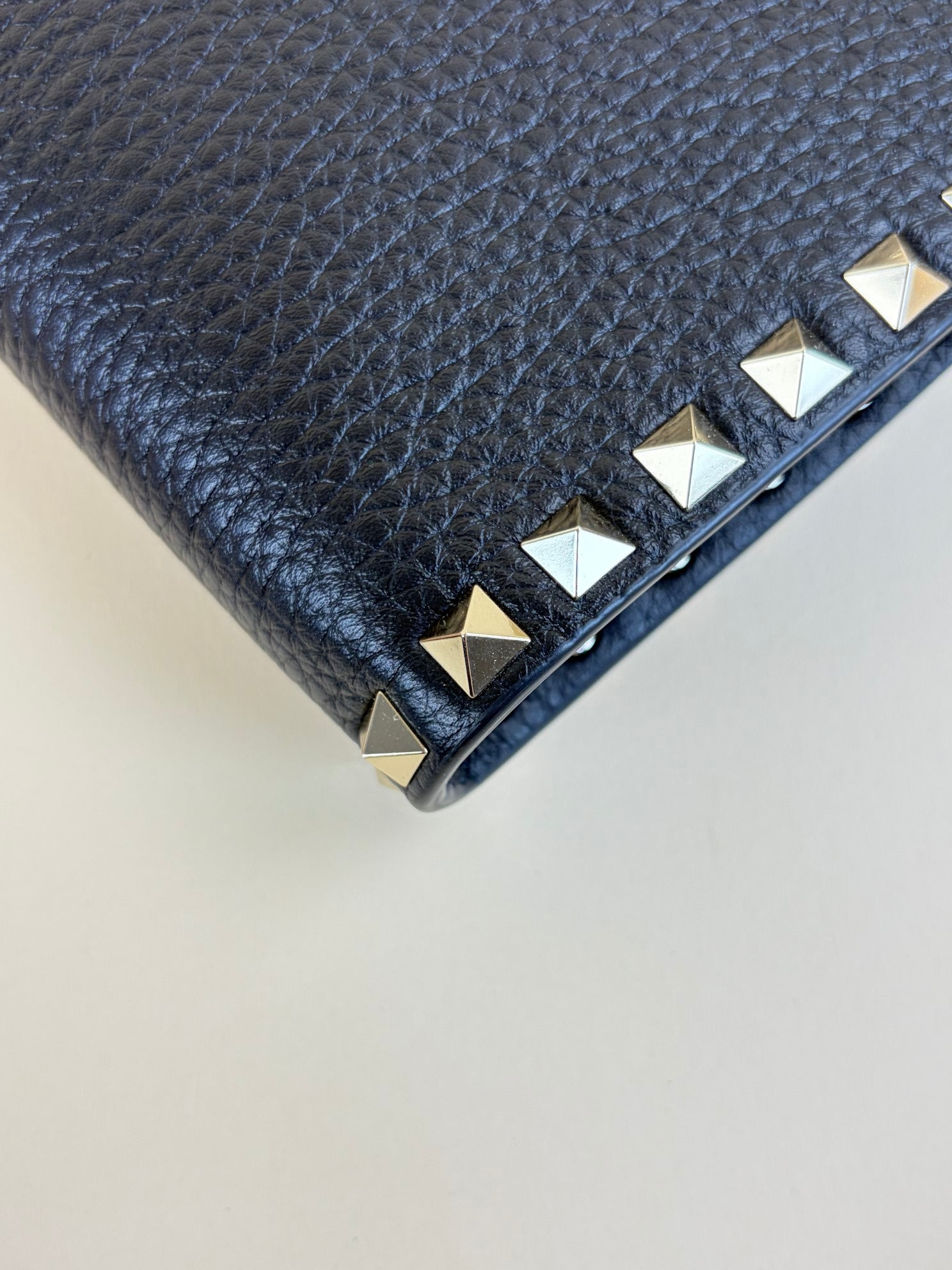 Valentino Black pebbled calfskin rockstud medium zip pouch