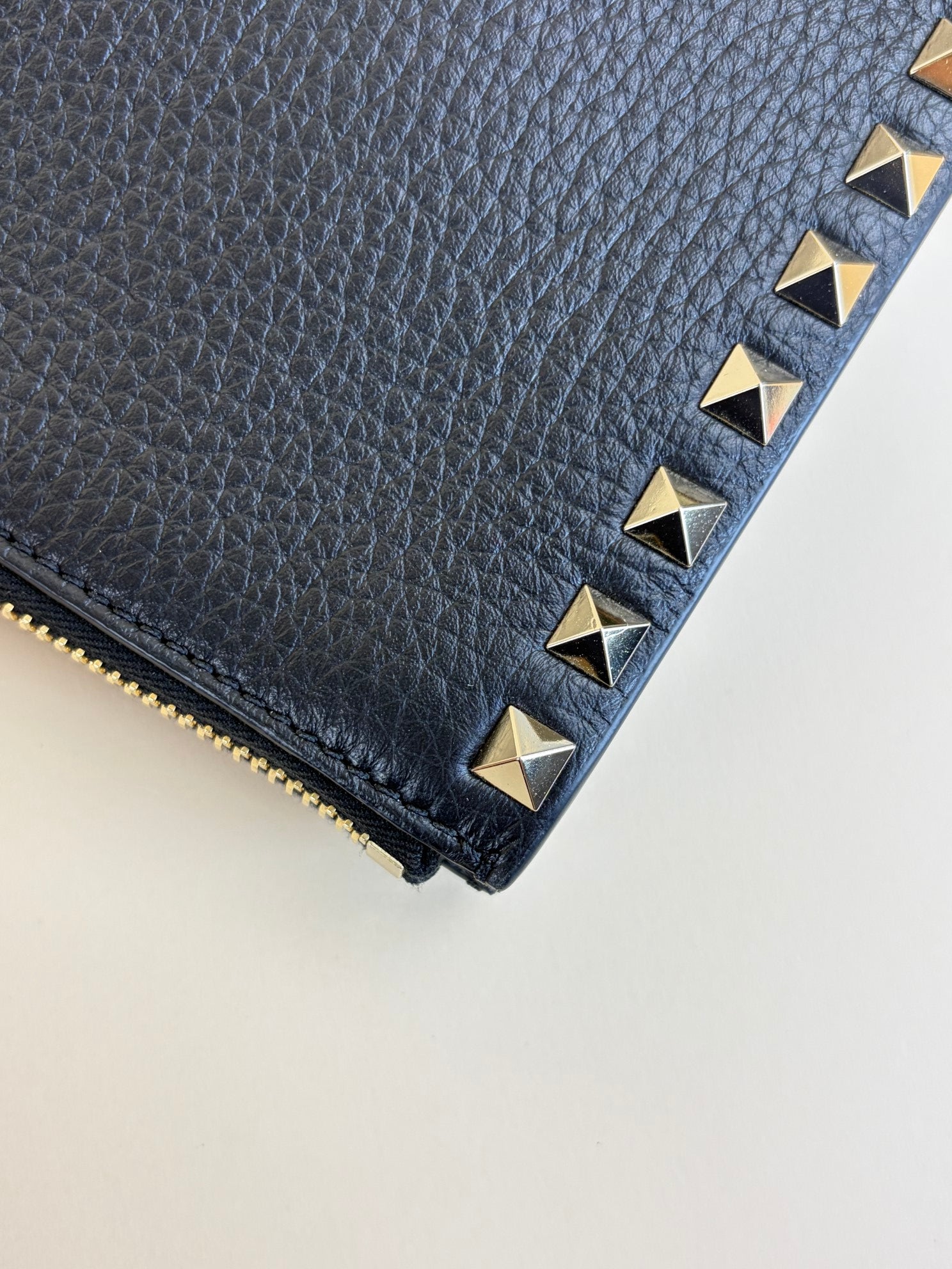 Valentino Black pebbled calfskin rockstud medium zip pouch