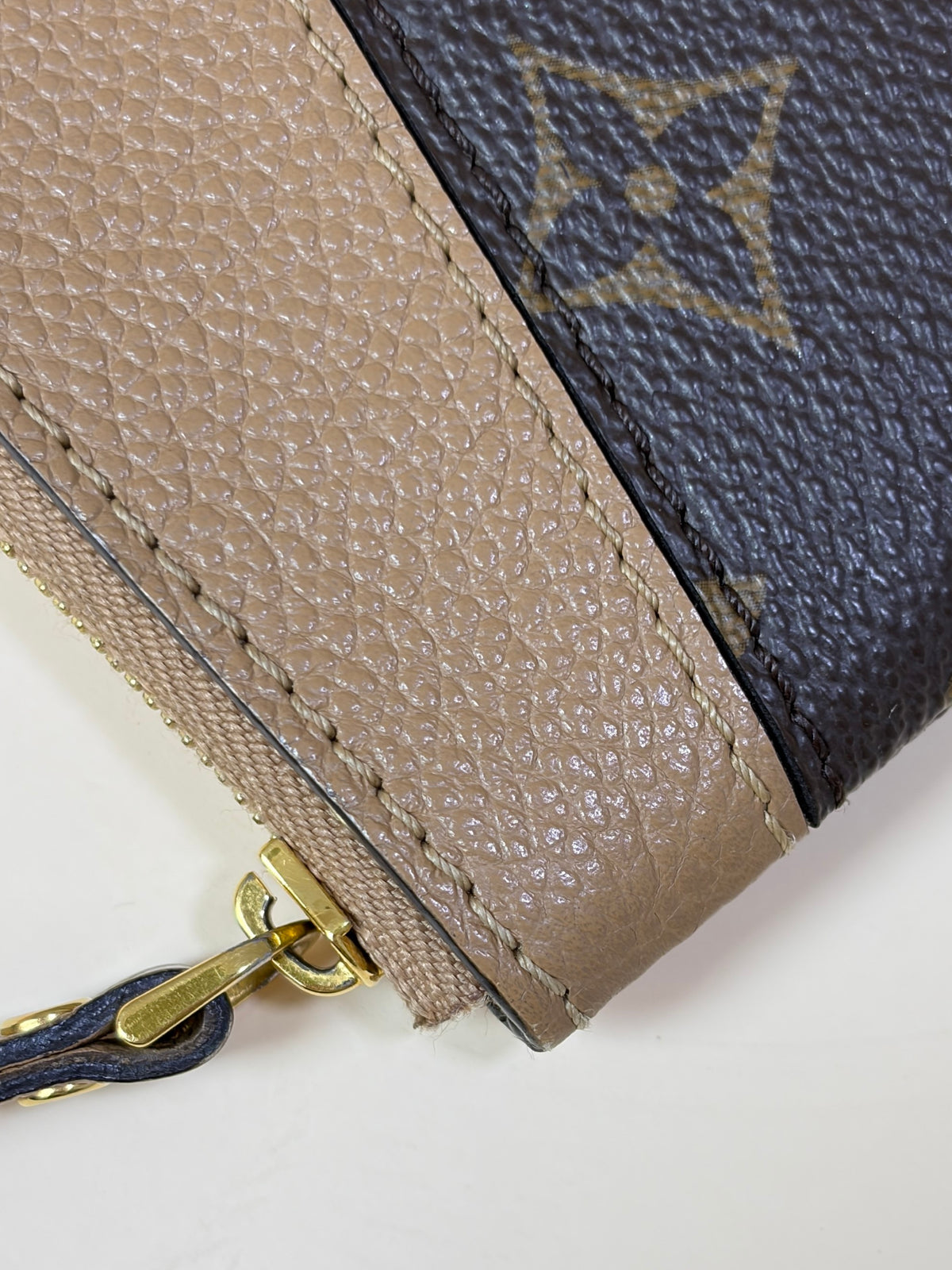 Louis Vuitton brown calfskin monogram canvas daily pouch