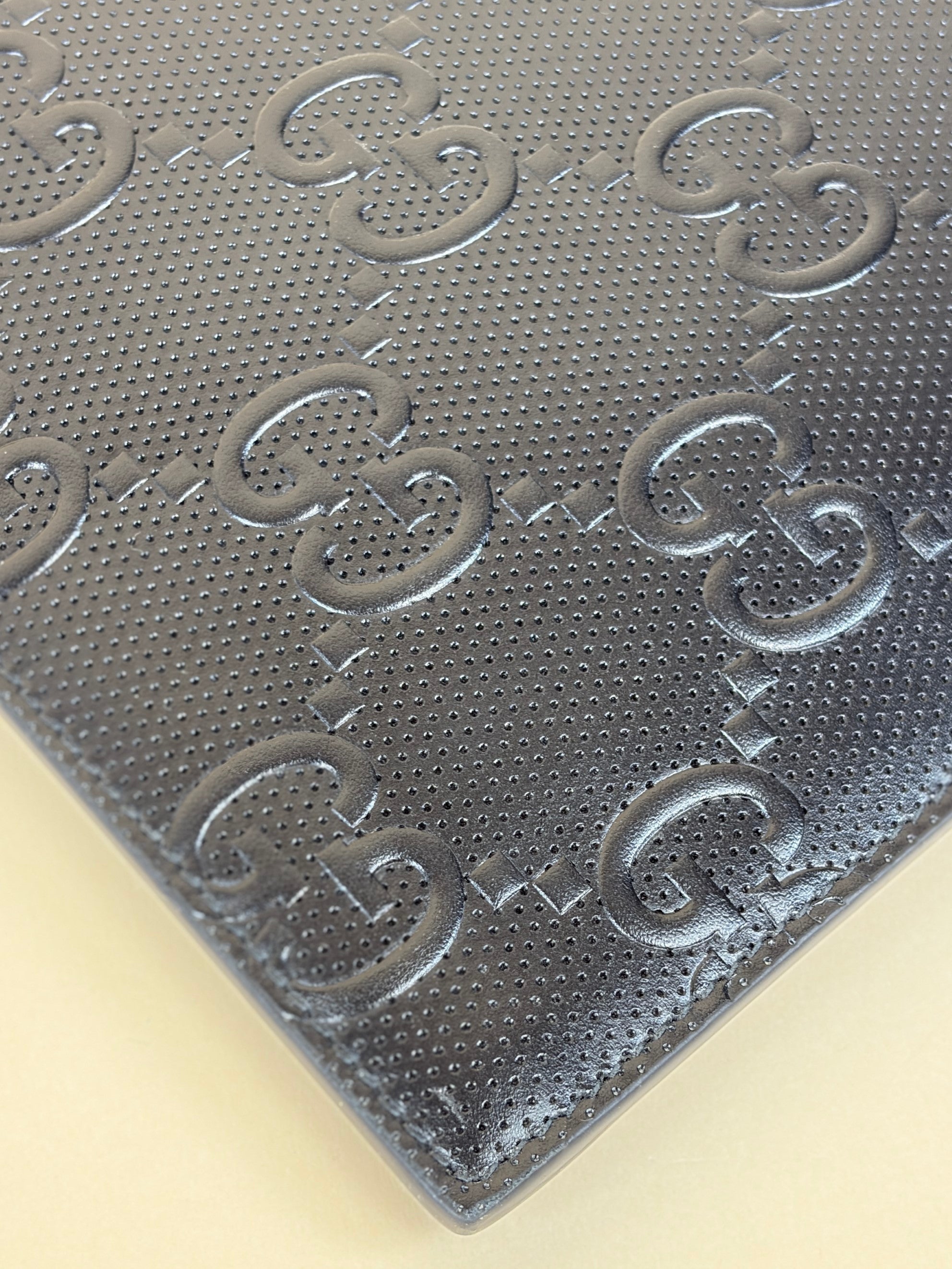 Gucci black Clutch calf skin gg tennis embossed wristlet pouch