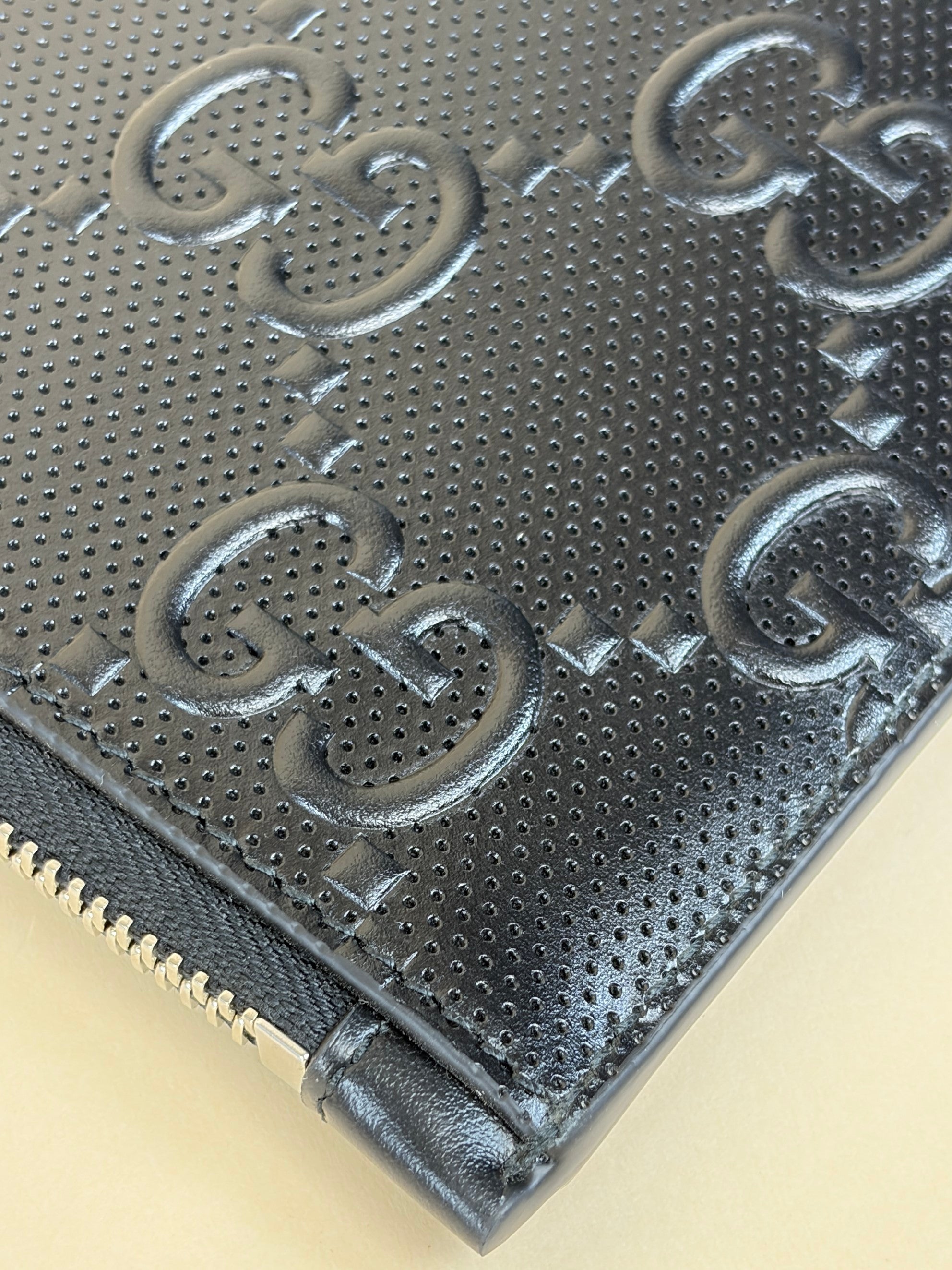 Gucci black Clutch calf skin gg tennis embossed wristlet pouch