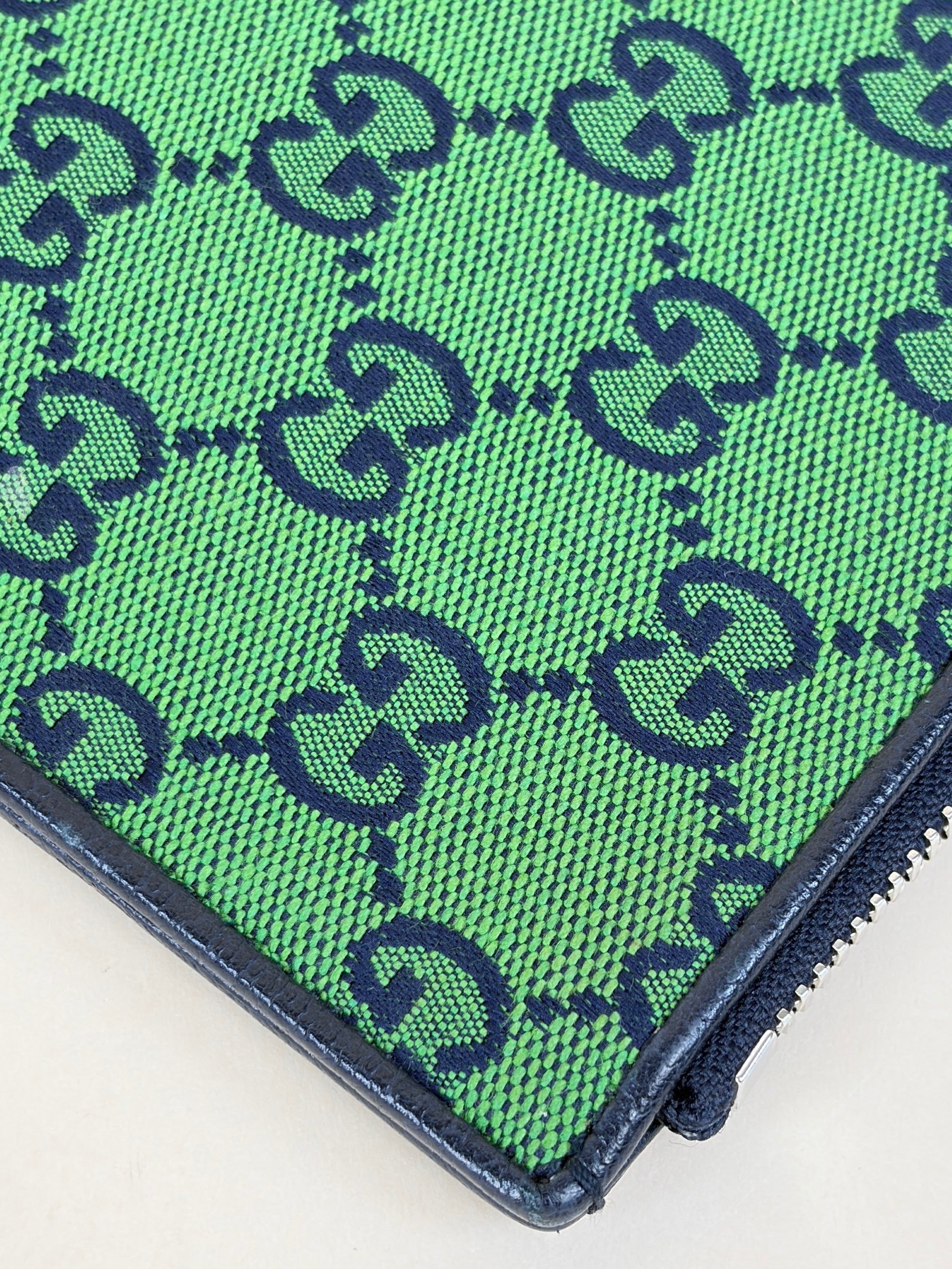 Gucci blue gg monogram multi color retro interlocking g wristlet pouch