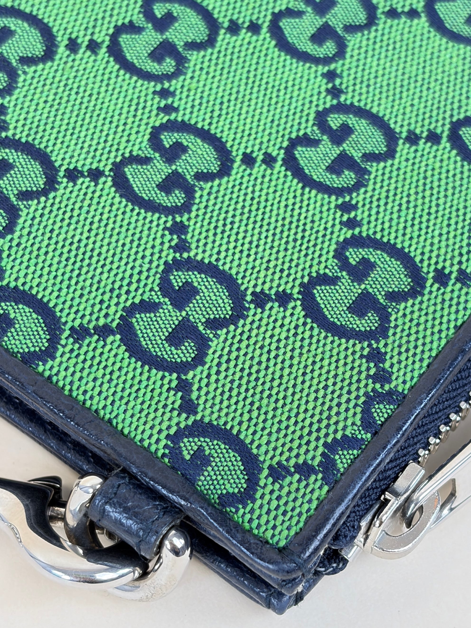 Gucci blue gg monogram multi color retro interlocking g wristlet pouch