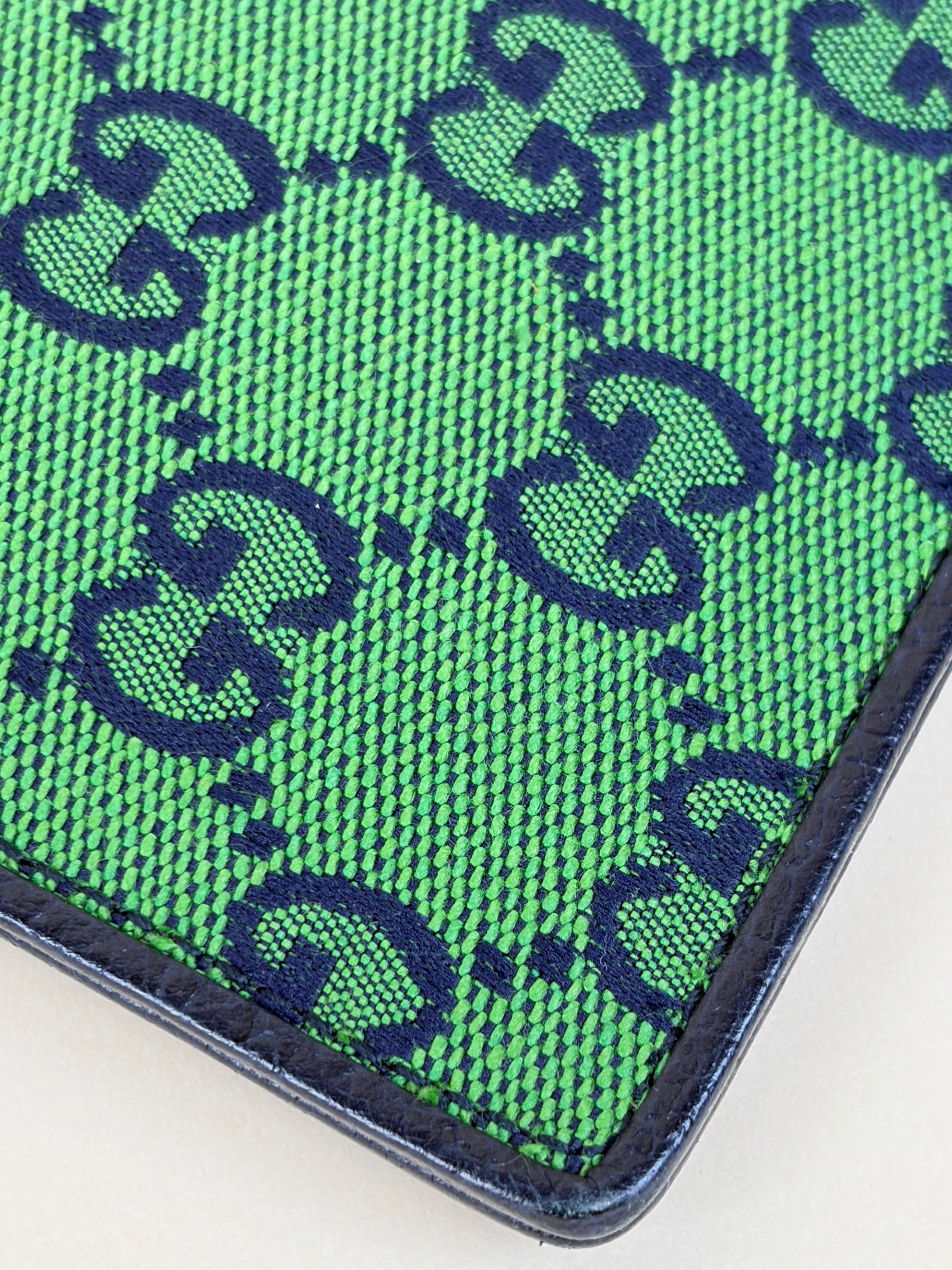 Gucci blue gg monogram multi color retro interlocking g wristlet pouch