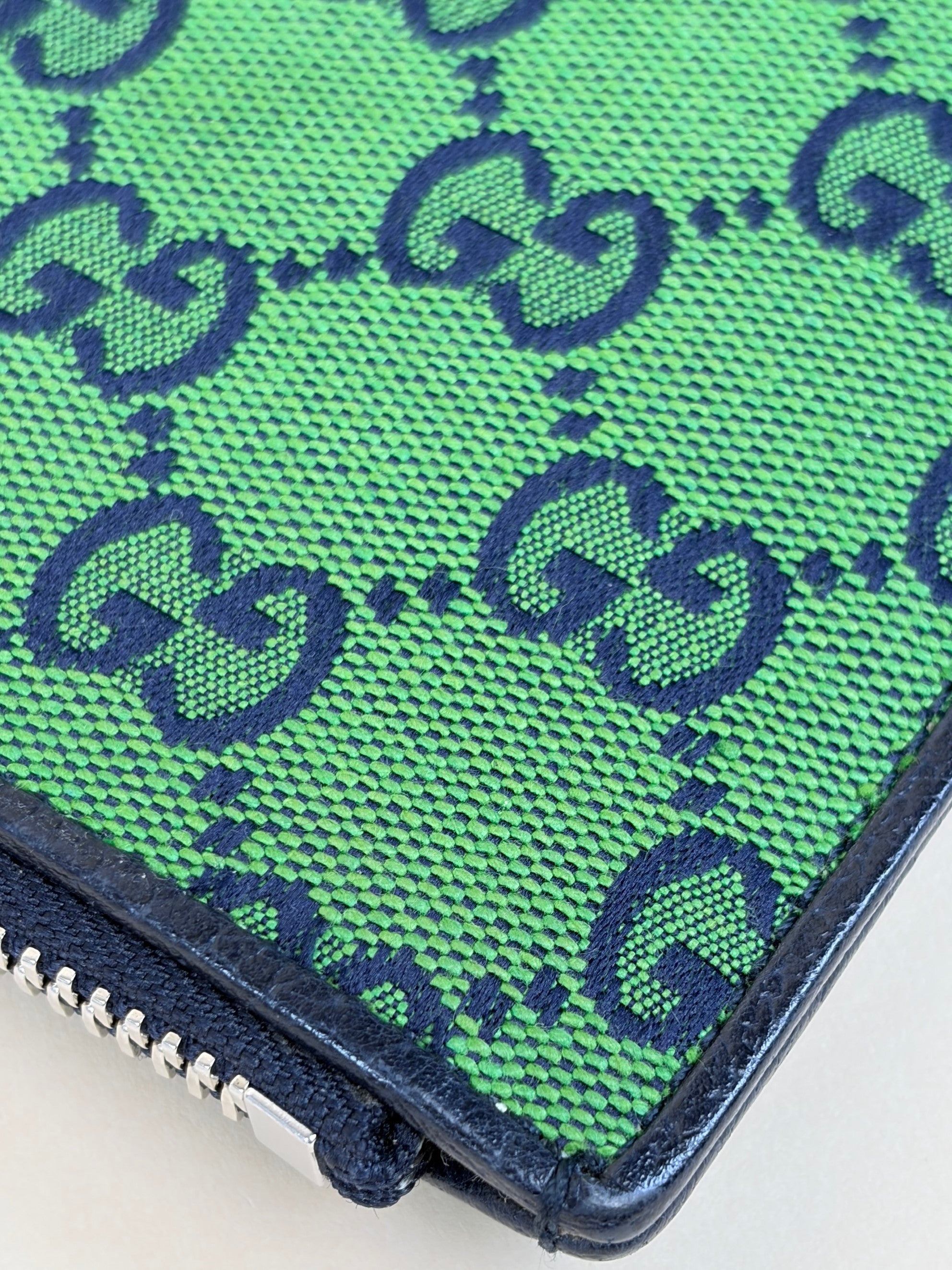 Gucci blue gg monogram multi color retro interlocking g wristlet pouch