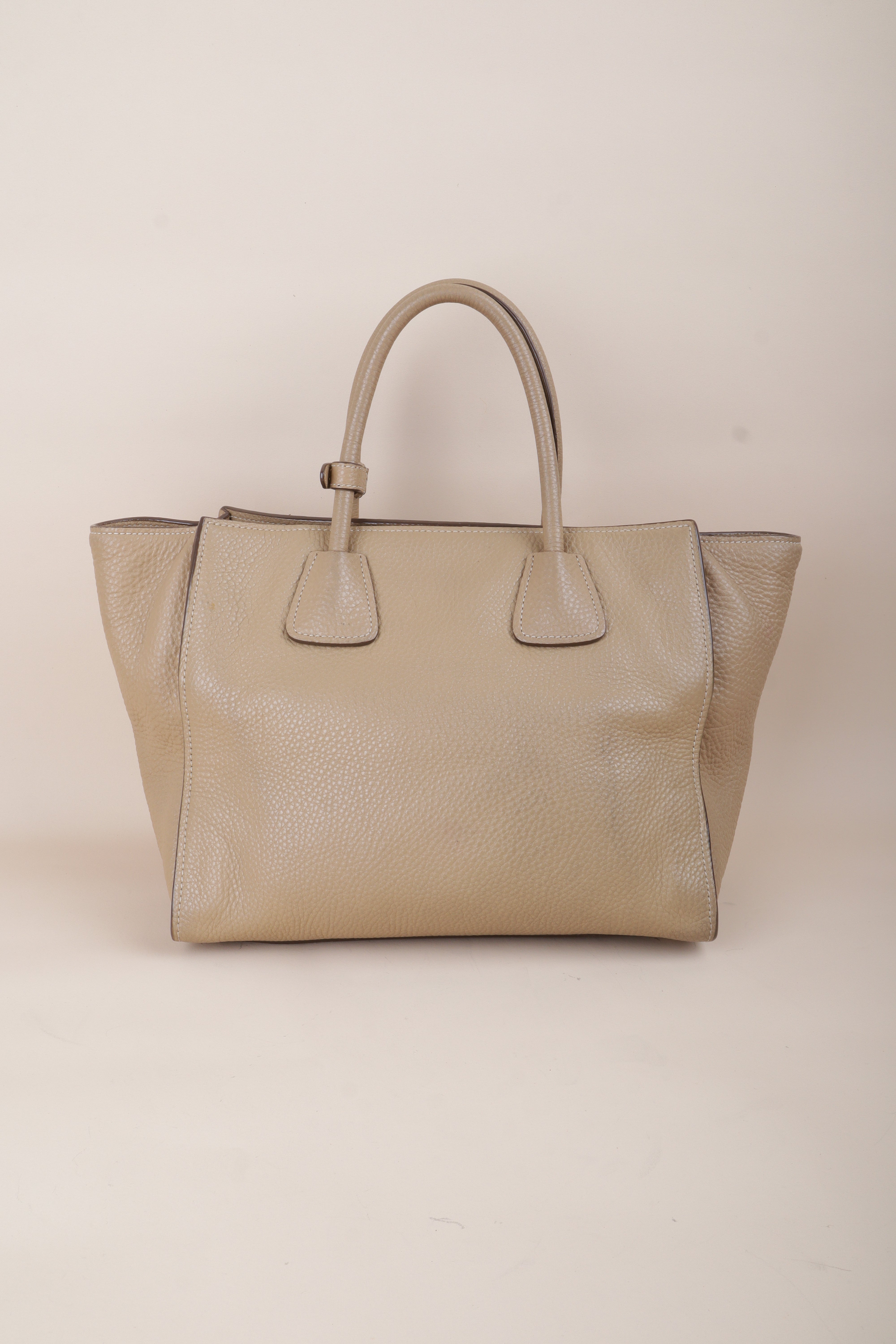 Prada beige front pocket wing convertible
