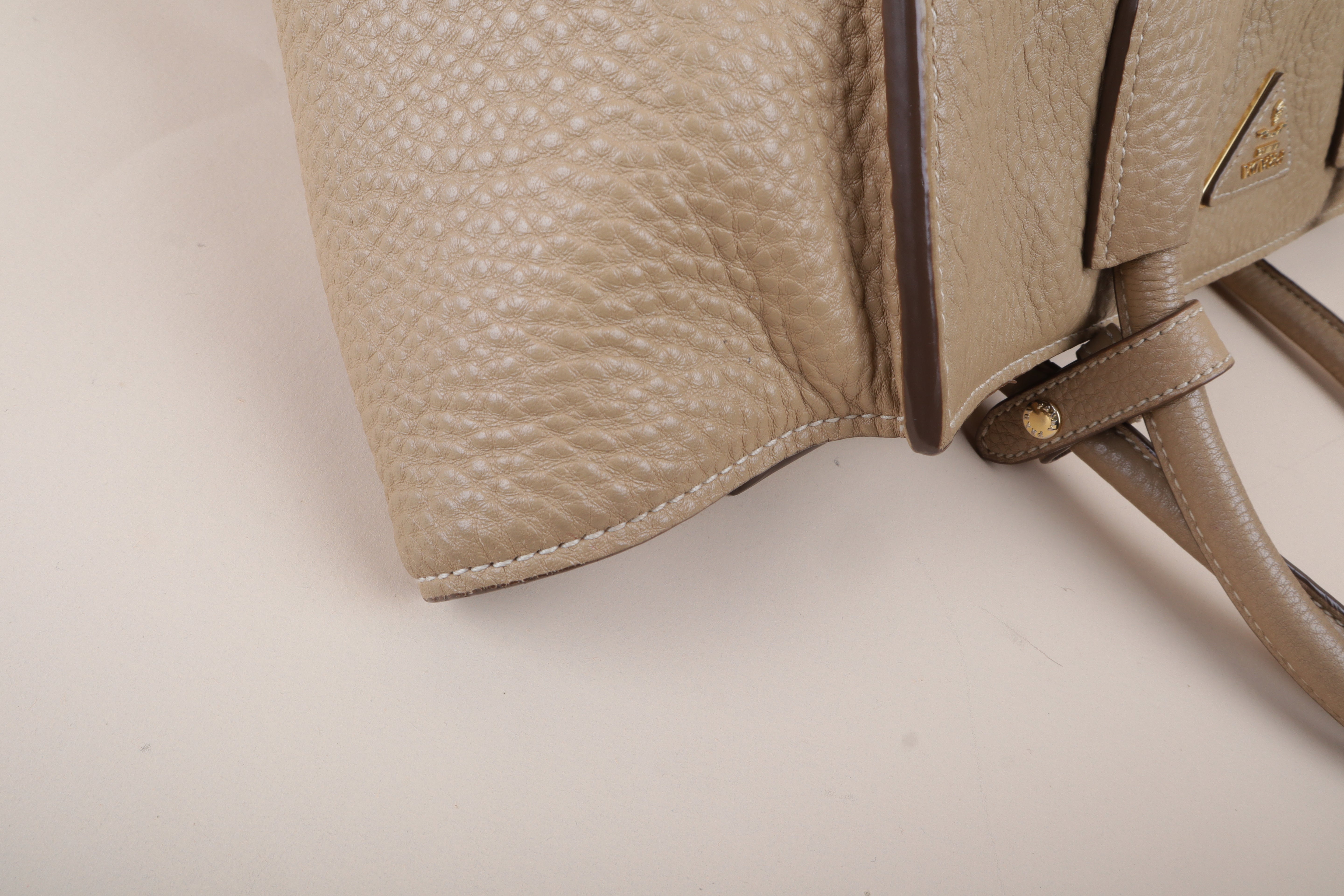 Prada beige front pocket wing convertible
