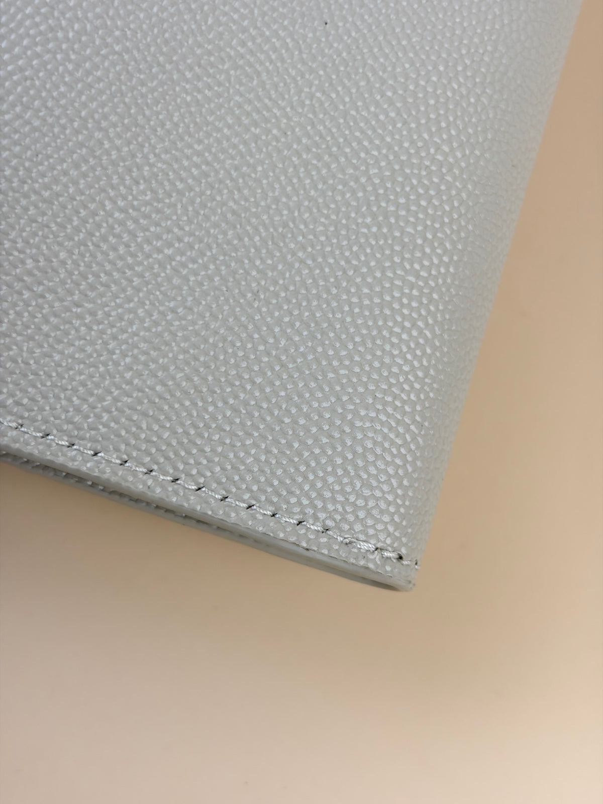 YSL white grain de Poudre leather Uptown pouch