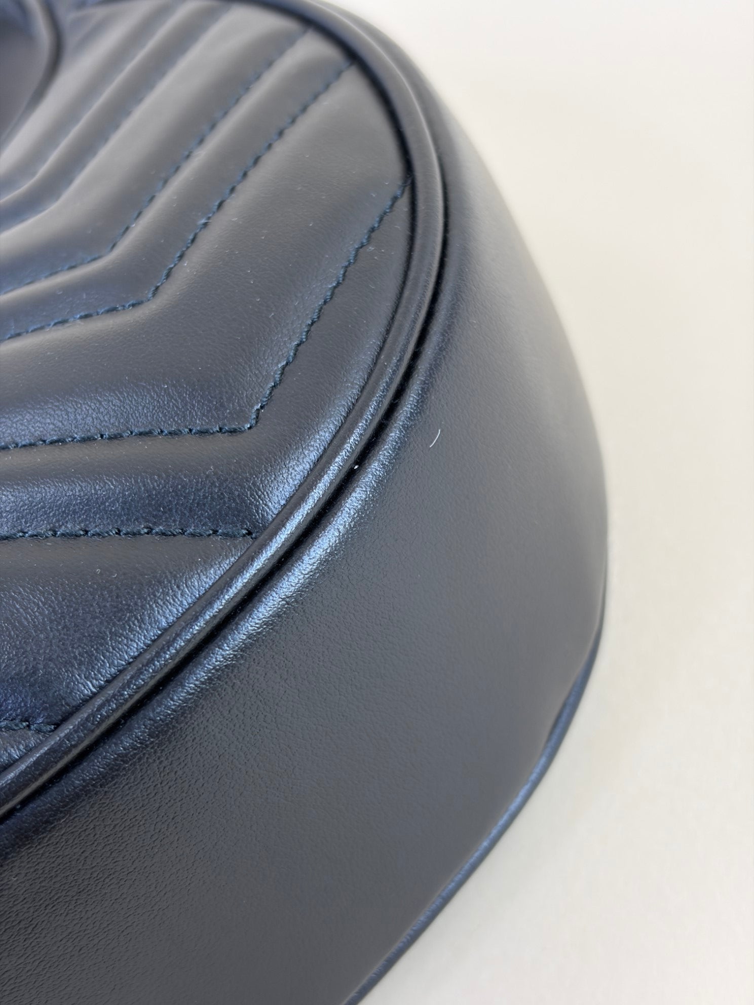 Gucci calfskin matelassé Black chevron small GG Marmont half-moon hob bag