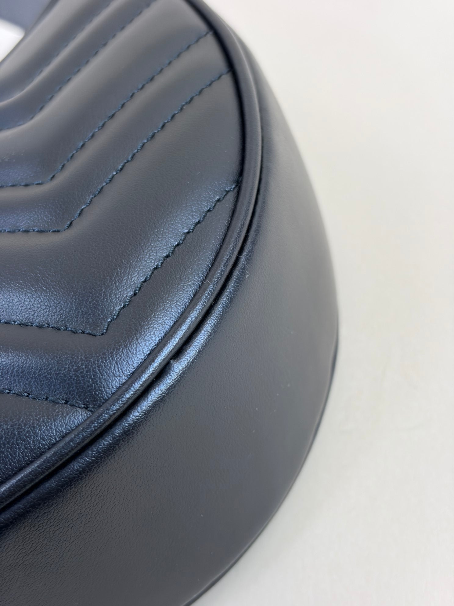 Gucci calfskin matelassé Black chevron small GG Marmont half-moon hob bag