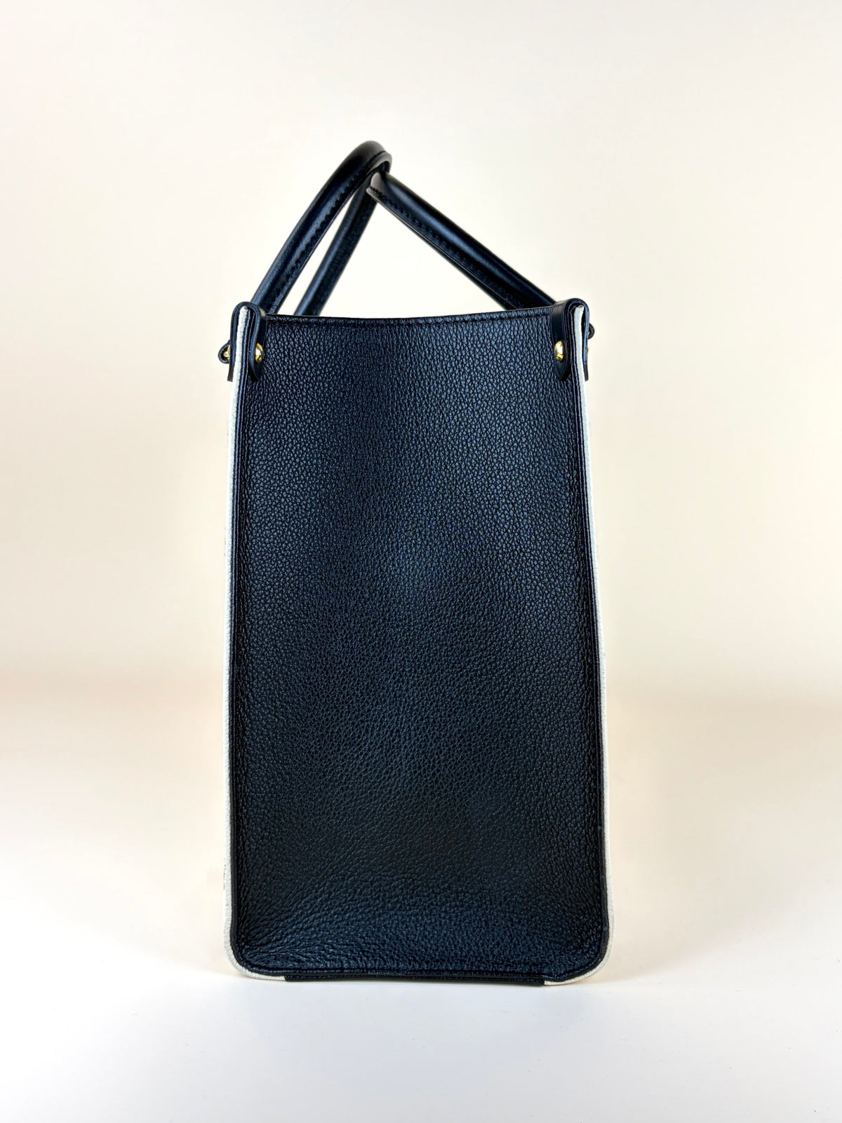 Louis Vuitton black/cream monogram empriente broderies on the go mm tote bag