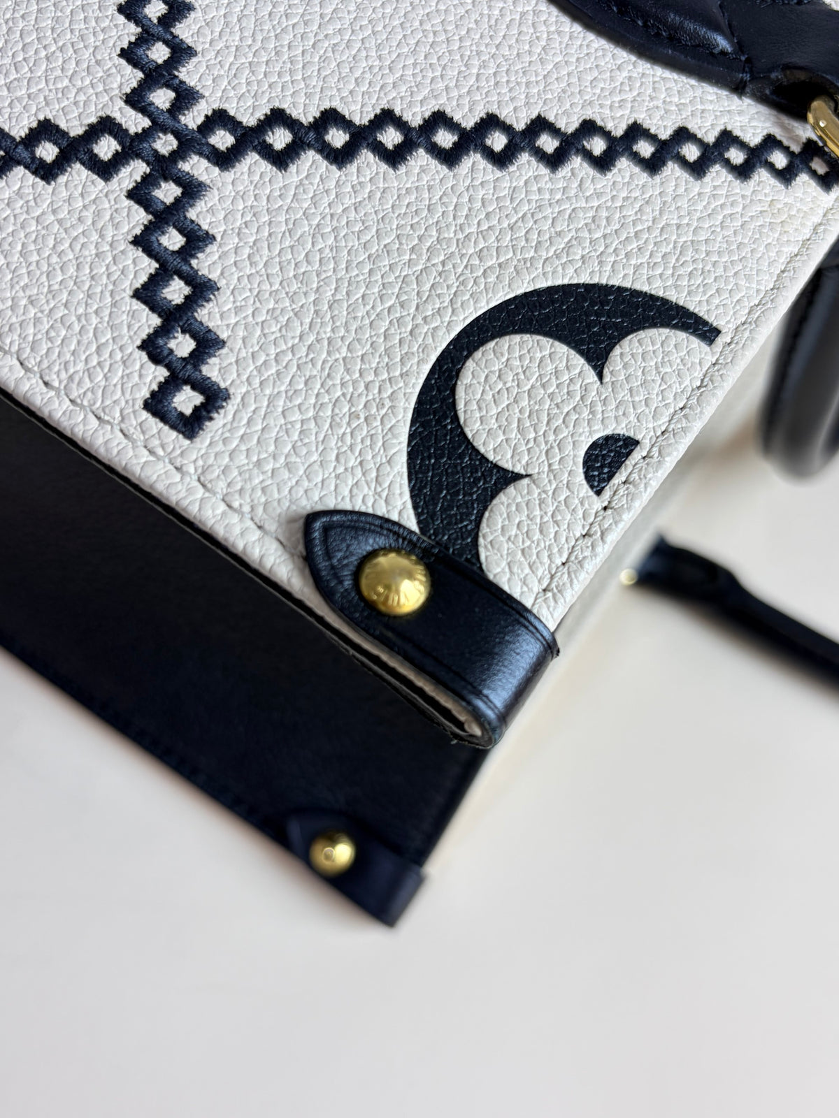 Louis Vuitton black/cream monogram empriente broderies on the go mm tote bag