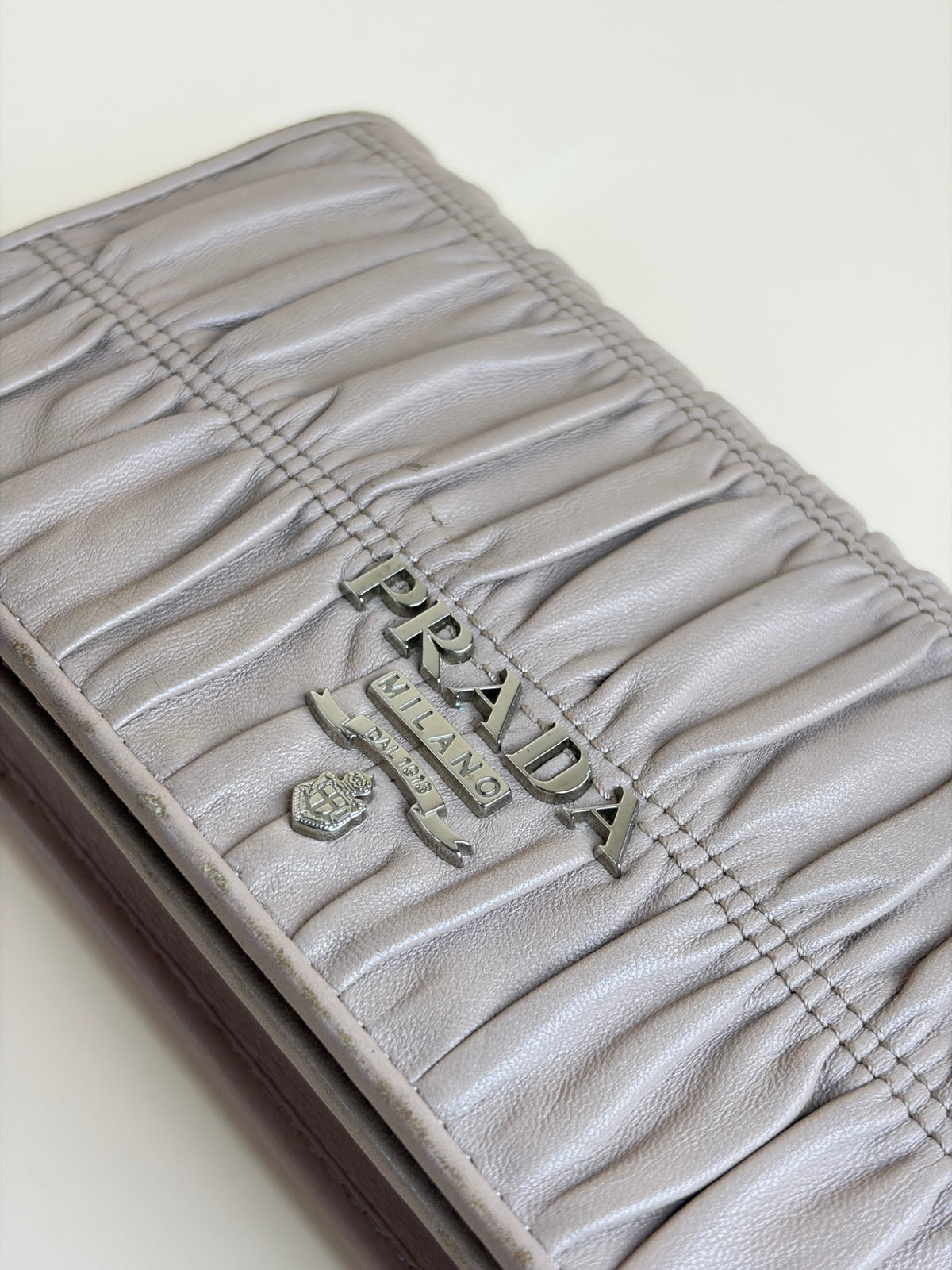 Prada nude nappa leather gaufre wallet on chain