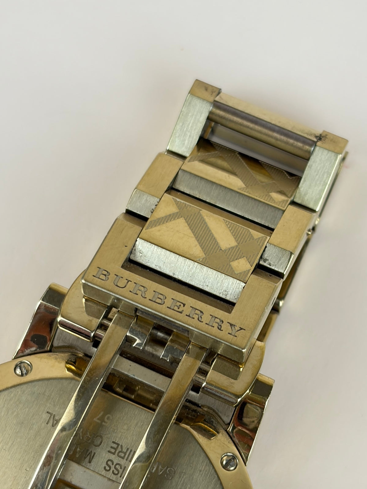 Burberry the city Gold Watch tone