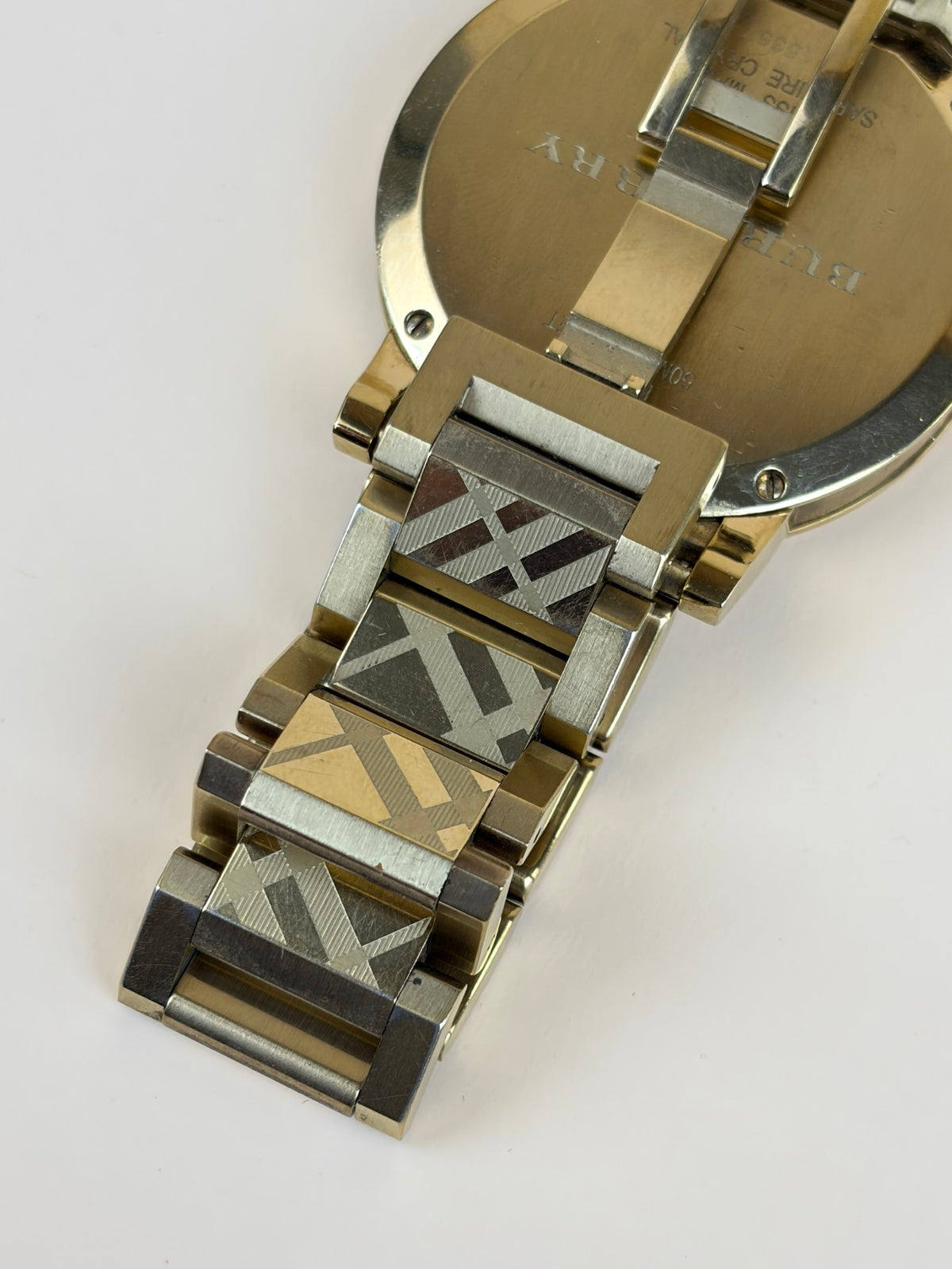 Burberry the city Gold Watch tone