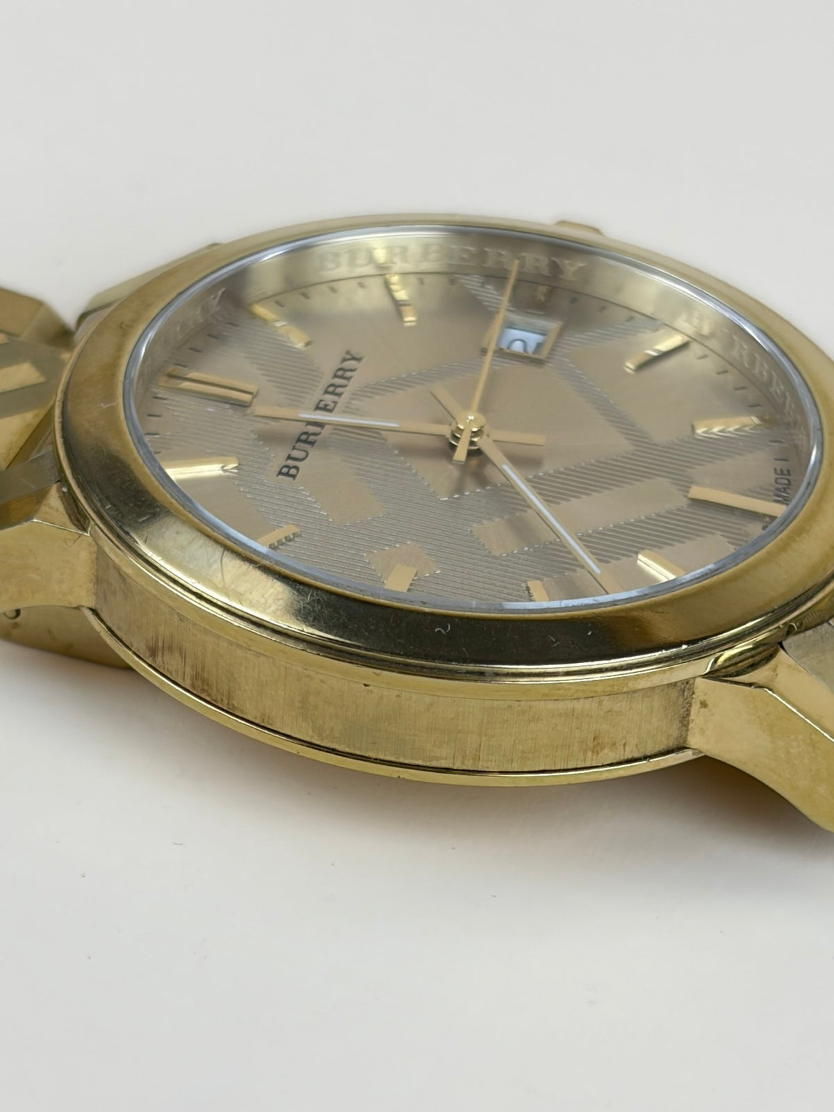 Burberry the city Gold Watch tone