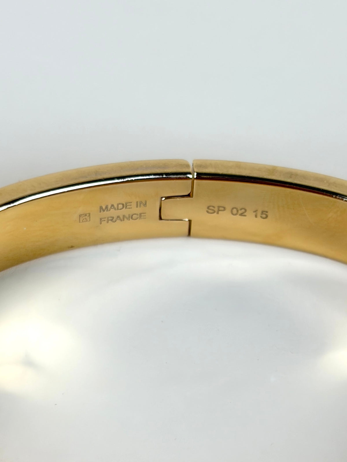 Hermes rose gold plated maron glace mini clic kelly bracelet