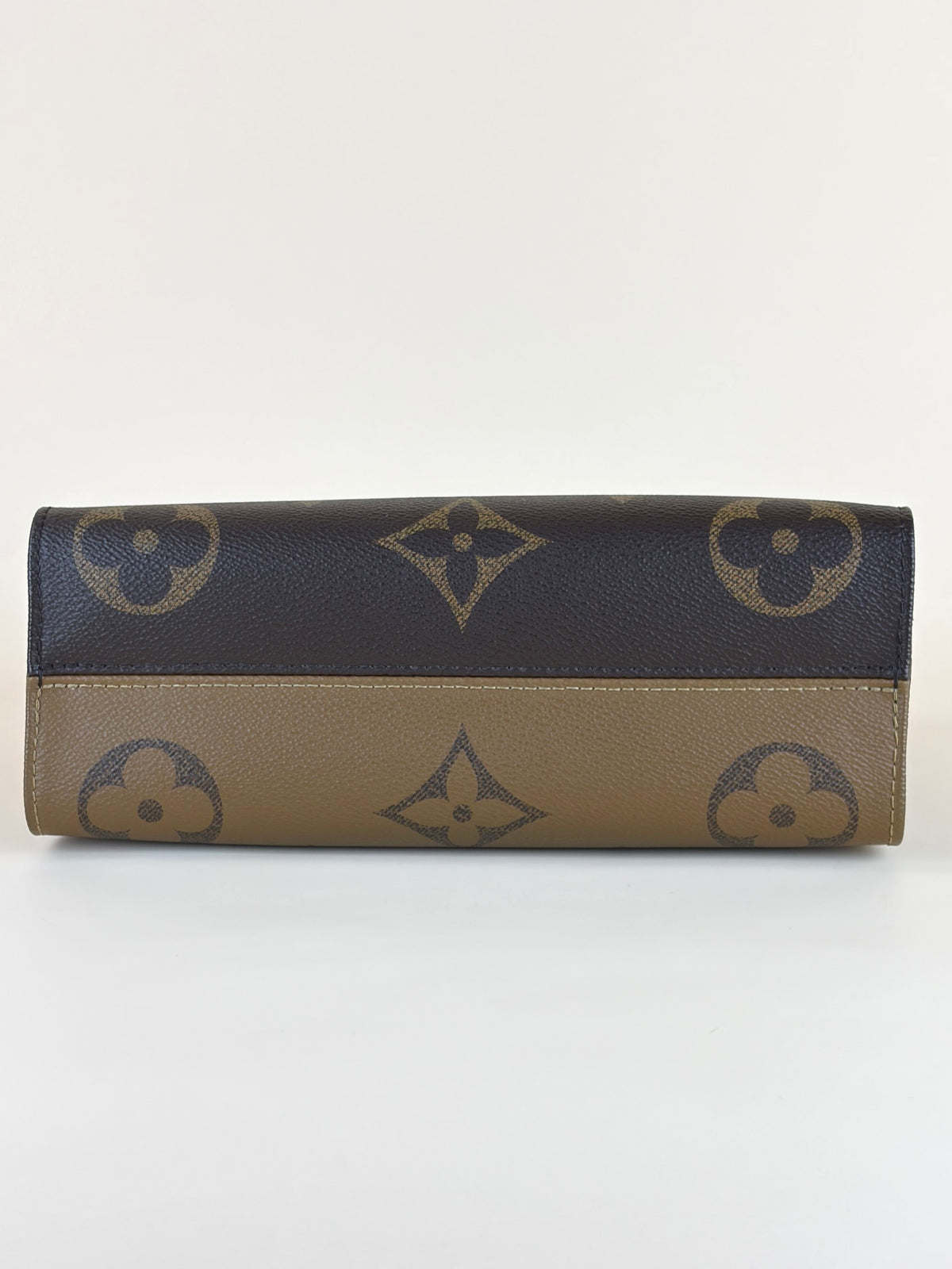 Louis Vuitton monogram reverse canvas on the go east-west tote bag