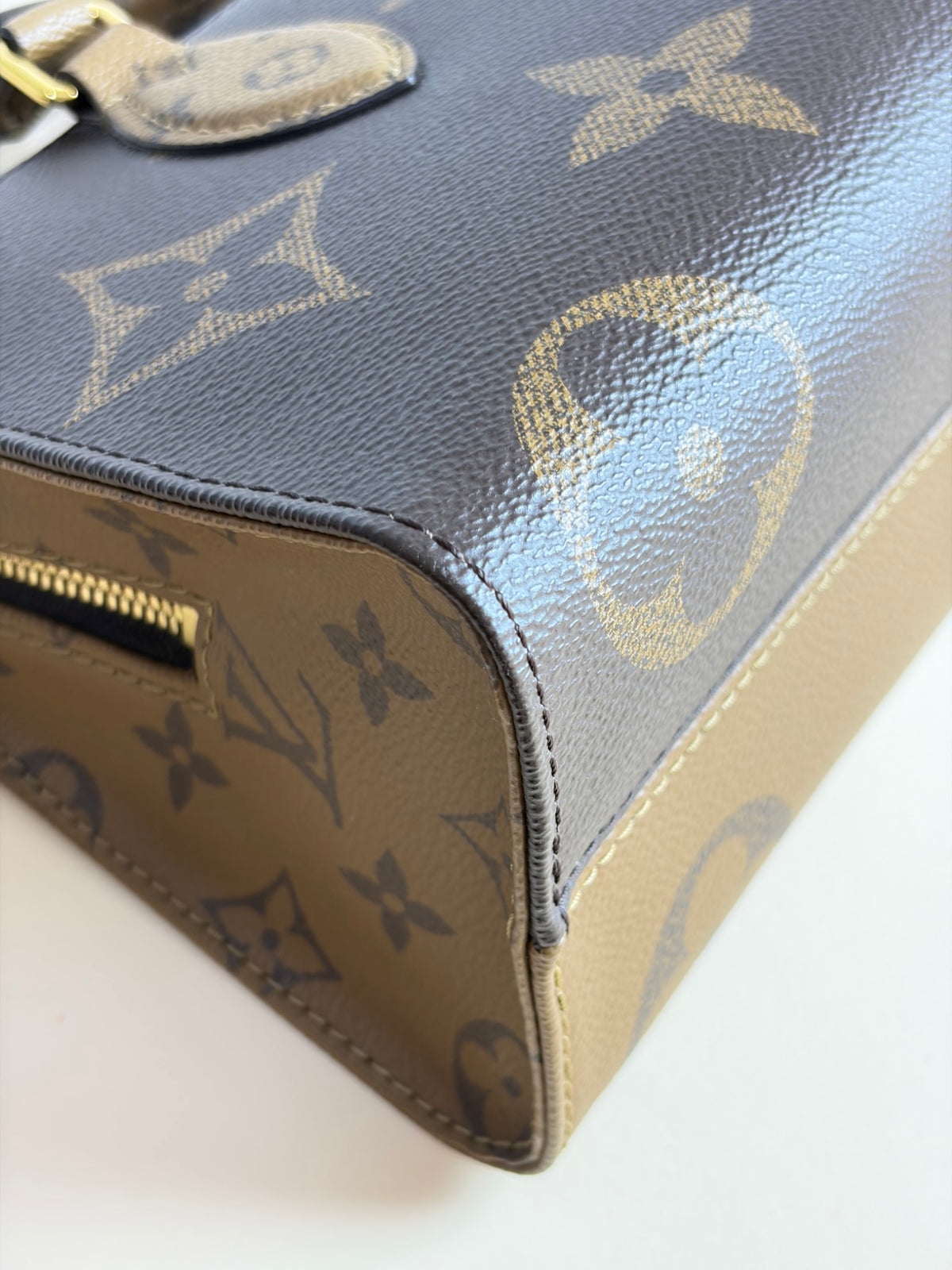 Louis Vuitton monogram reverse canvas on the go east-west tote bag