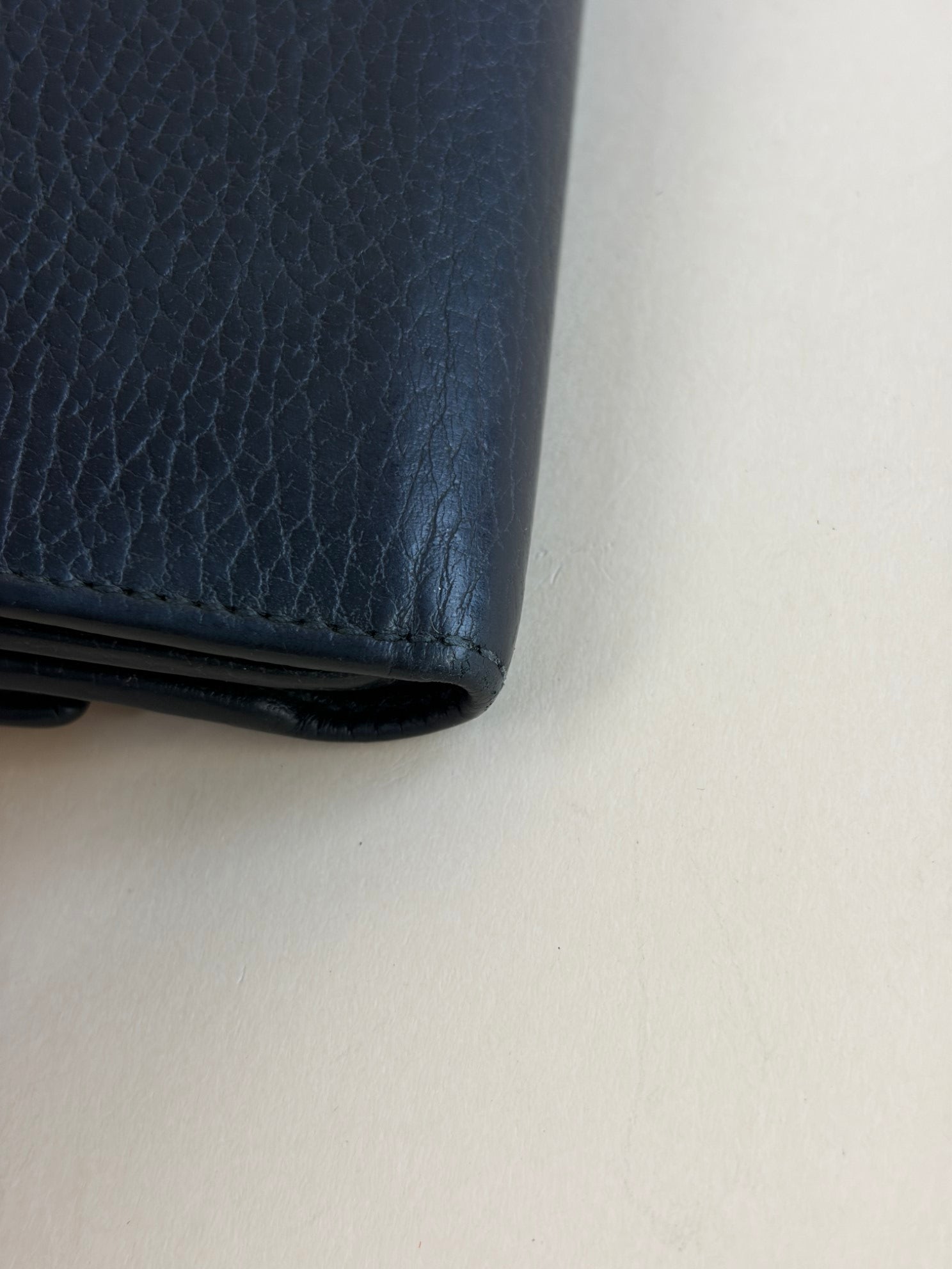 Gucci Black GG Marmont tri- fold compact wallet gold hardware