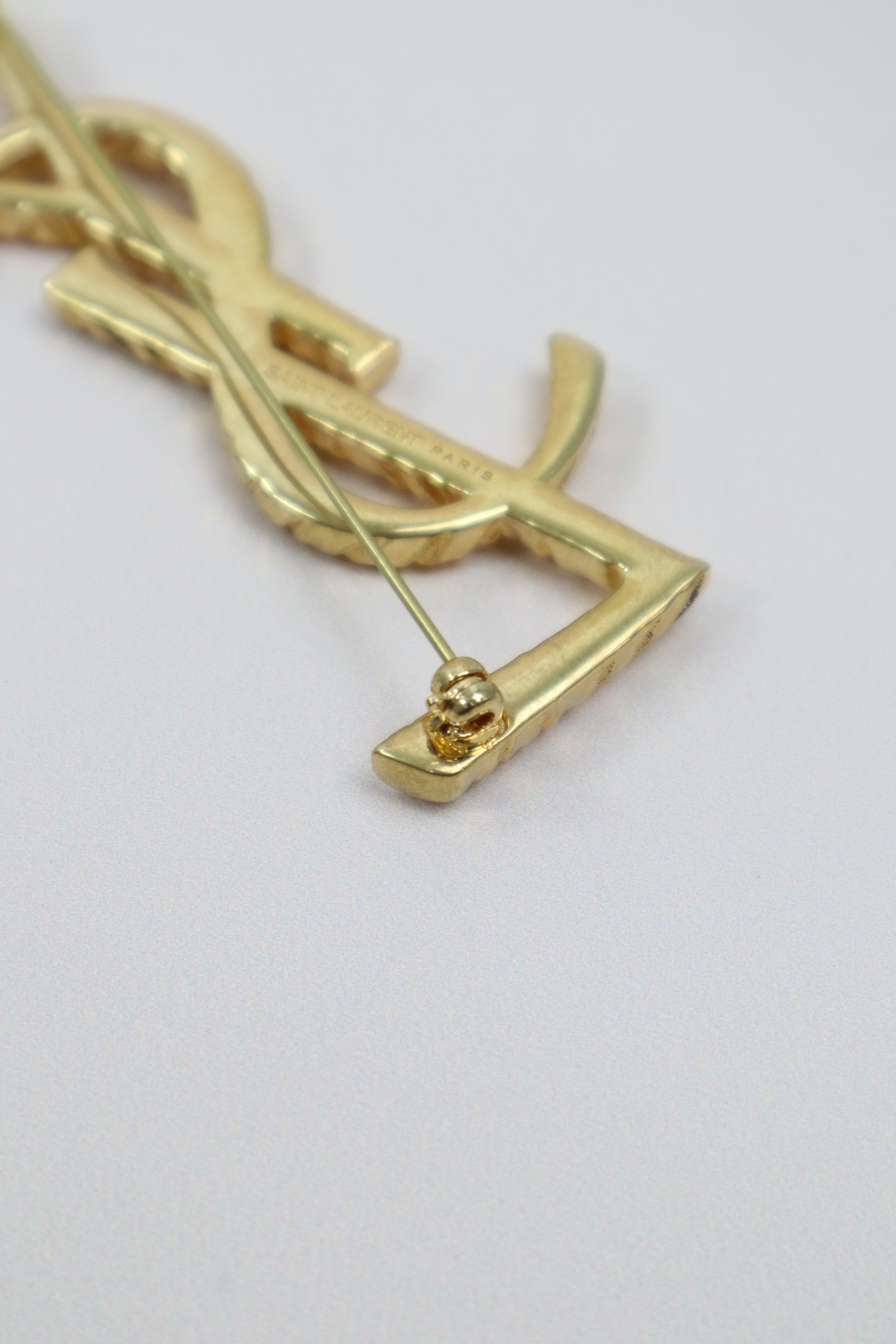 YSL Gold Logo Brooch