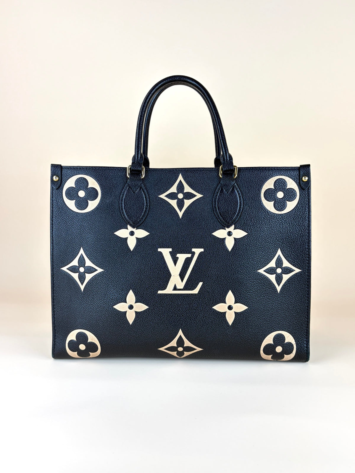 Louis Vuitton black/beige Monogram giant empriente on the go mm bag
