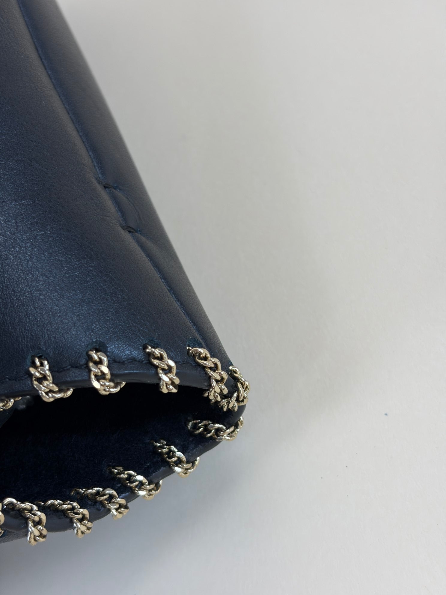 Valentin black calfskin small chain trimmed demi/une double