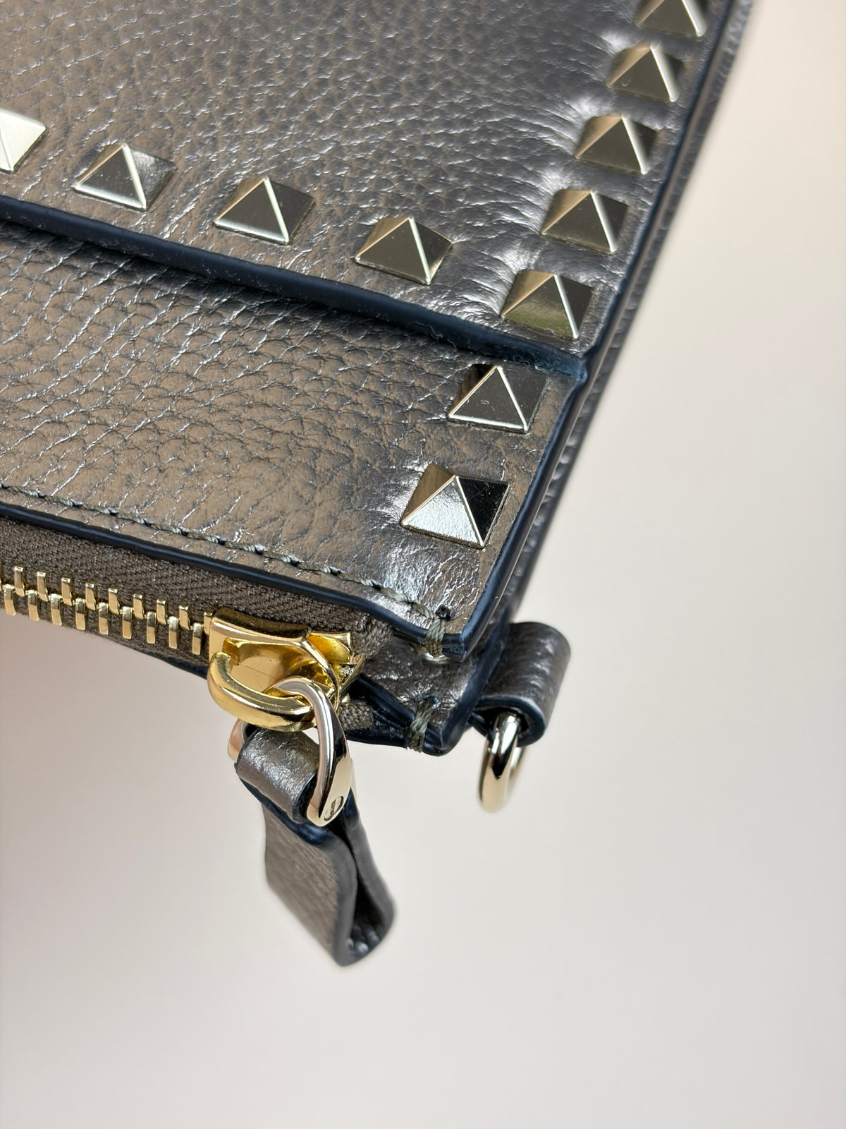 Valentino metallic gold pebbled calfskin rock stud medium zip pouch