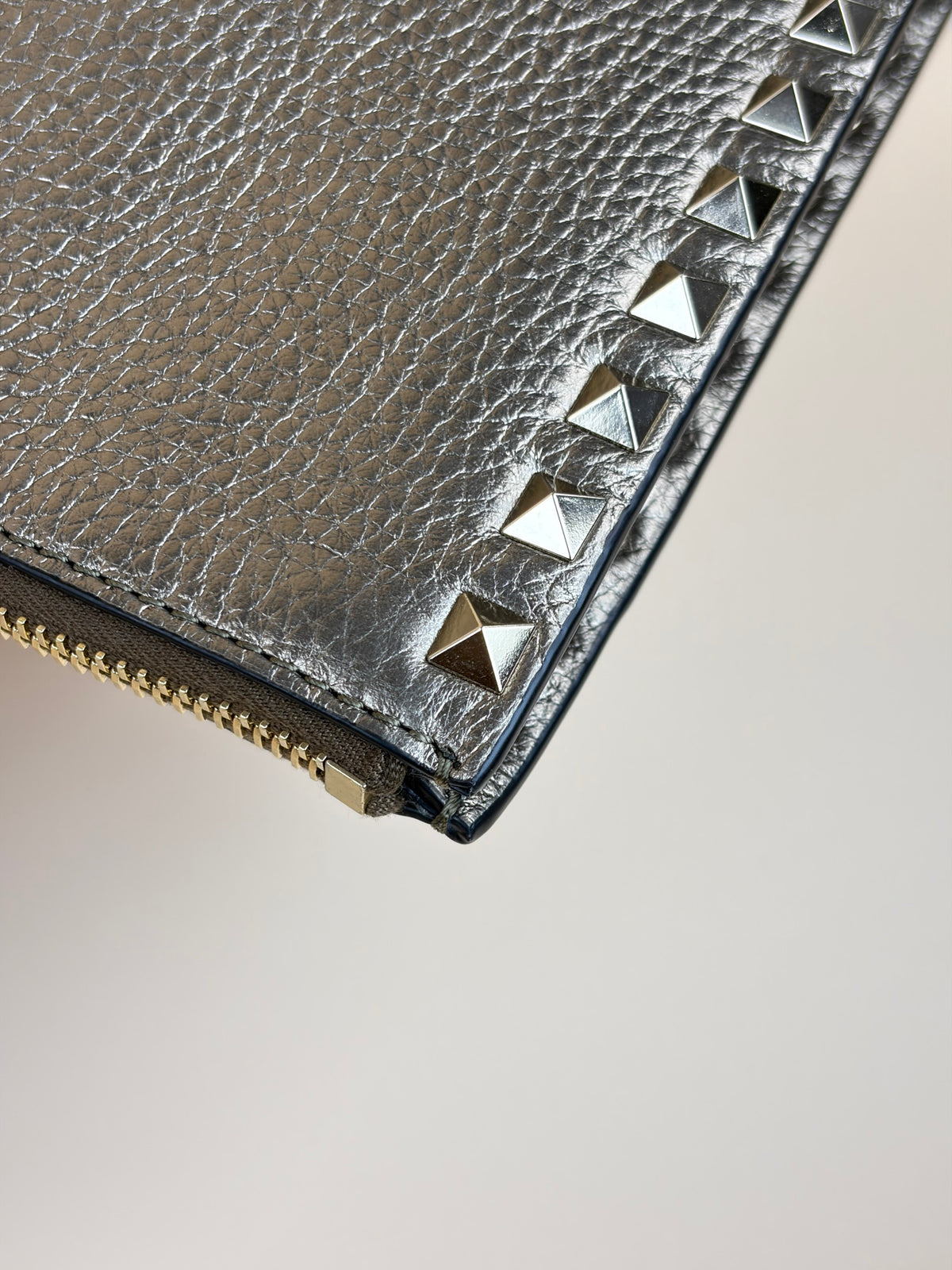 Valentino metallic gold pebbled calfskin rock stud medium zip pouch